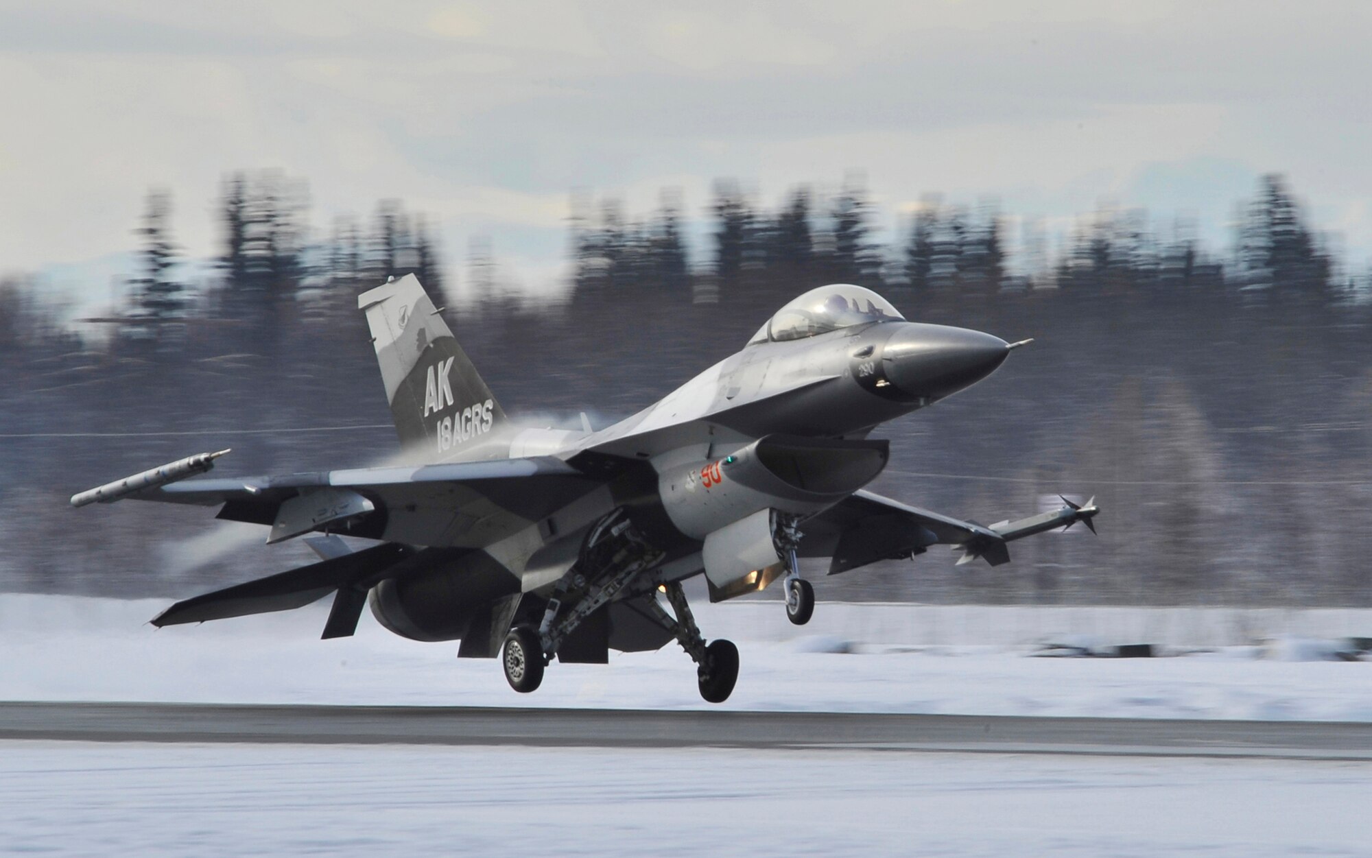 An F-16 Fighting Falcon touches down April 8, 2011, at Eielson Air Force Base, Alaska. (U.S. Air Force photo/Staff Sgt. Christopher Boitz)