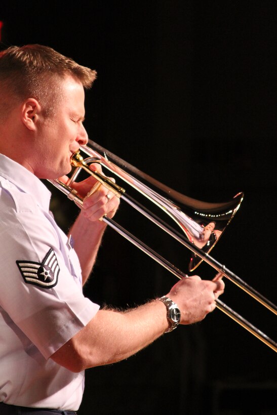 Staff Sergeant Rob Hyatt plays an intense solo at the University of Wisconsin-Eau Claire's Jazz Festival. SSgt Hyatt is a member of the USAF Band of Mid-America's "Shade's of Blue" Jazz Ensemble. The group played three concerts throughout the four day festival. 