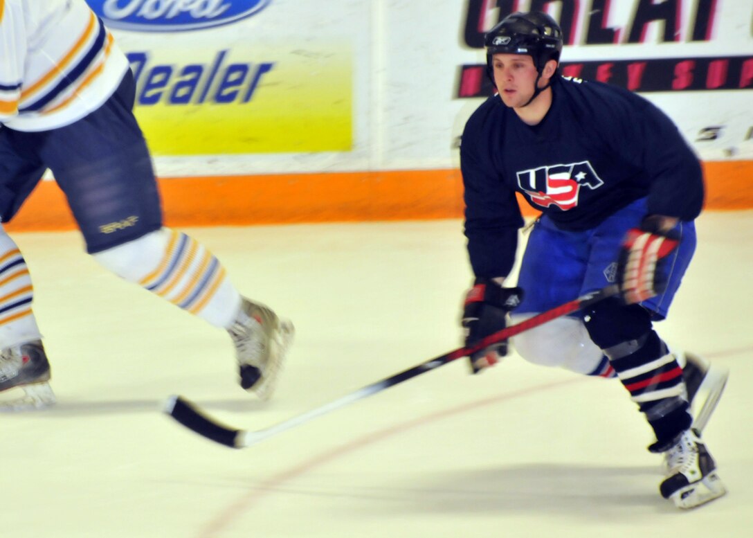 The Buffalo Sabres Alumni Team play hockey against The Niagara Falls Air Reserve Station Team April 10, 2011 at the Niagara University Campus Dwyer Arena Niagara Falls NY.  Proceeds from the game will benefit The Family Readiness Units of the 914th and 107th units based at the Niagara Falls Air force Base. (U.S. Air Force photo by Staff Sgt. Joseph McKee)