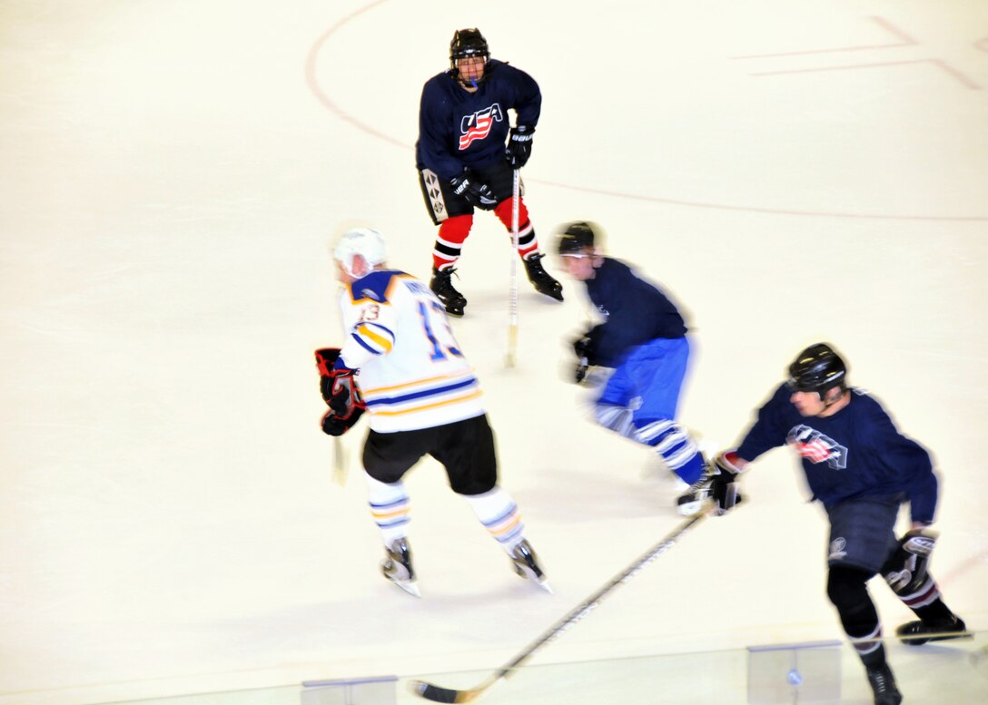 The Buffalo Sabres Alumni Team play hockey against The Niagara Falls Air Reserve Station Team April 10, 2011 at the Niagara University Campus Dwyer Arena Niagara Falls NY.  Proceeds from the game will benefit The Family Readiness Units of the 914th and 107th units based at the Niagara Falls Air force Base. (U.S. Air Force photo by Staff Sgt. Joseph McKee)