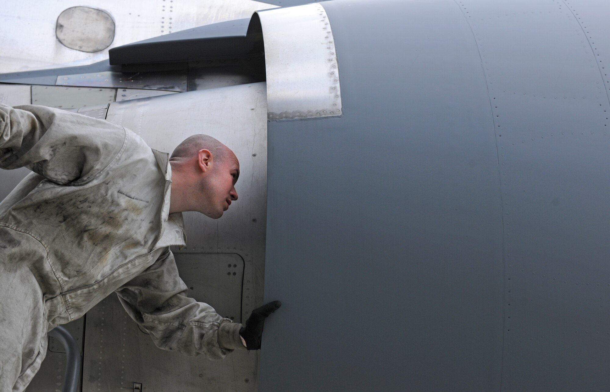 SPANGDAHLEM AIR BASE, Germany – Staff Sgt. Sean Durkin, 726th Air Mobility Squadron aircraft hydraulics journeyman, inspects a C-17 Globemaster III engine here April 12. The engine inspections are part of a comprehensive preflight inspection. The 726th AMS supports the overseas Air Mobility Command mission. (U.S. Air Force photo/Senior Airman Nathanael Callon)