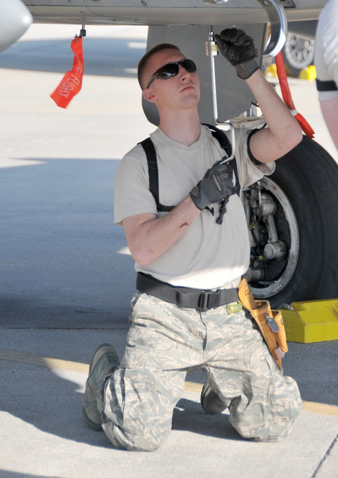 Staff Sergeant Ryan Quigley a weapons loader with the 104th Fighter Wing, Massachusetts Air National Guard prepares to load flares into an F-15 Eagle while deployed to Tyndall AFB Florida, in support of the Weapons System Evaluation Program (WSEP) on April 11, 2011. The two week training and evaluation program is important for ground crews to test their maintenance systems and processes while loading live munitions on F-15 Eagles, as well as critical live training for the F-15 pilots to employ air-to-air missiles against real world targets.