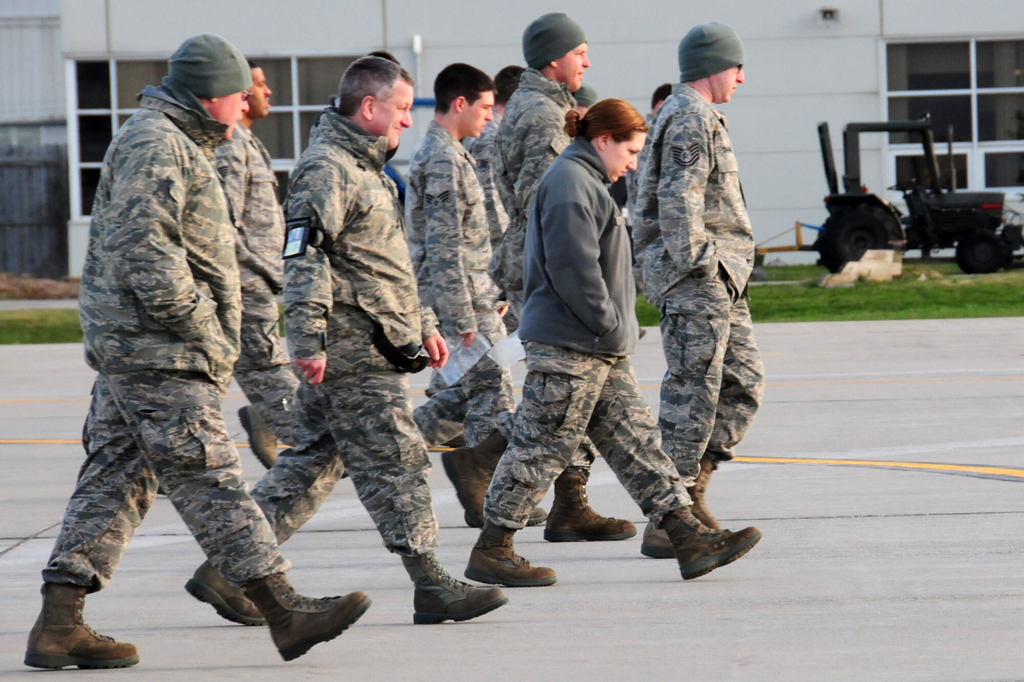 NIAGARA FALLS AIR RESERVE STATION, N.Y-  Members of the 914th (Air Force Reserve) and 107th Airlift Wing (New York Air National Guard), Niagara Falls ARS perform a weekly Foreign Object Debris (FOD) walk.  Typically this function is performed by maintenance and safety personnel, but it is everyone's responsibility to pick up any debris found while on the flight line.  This week a base wide announcement was made to invite all unit members to participate.  (U.S. Air Force Reserve photo by Peter Borys)