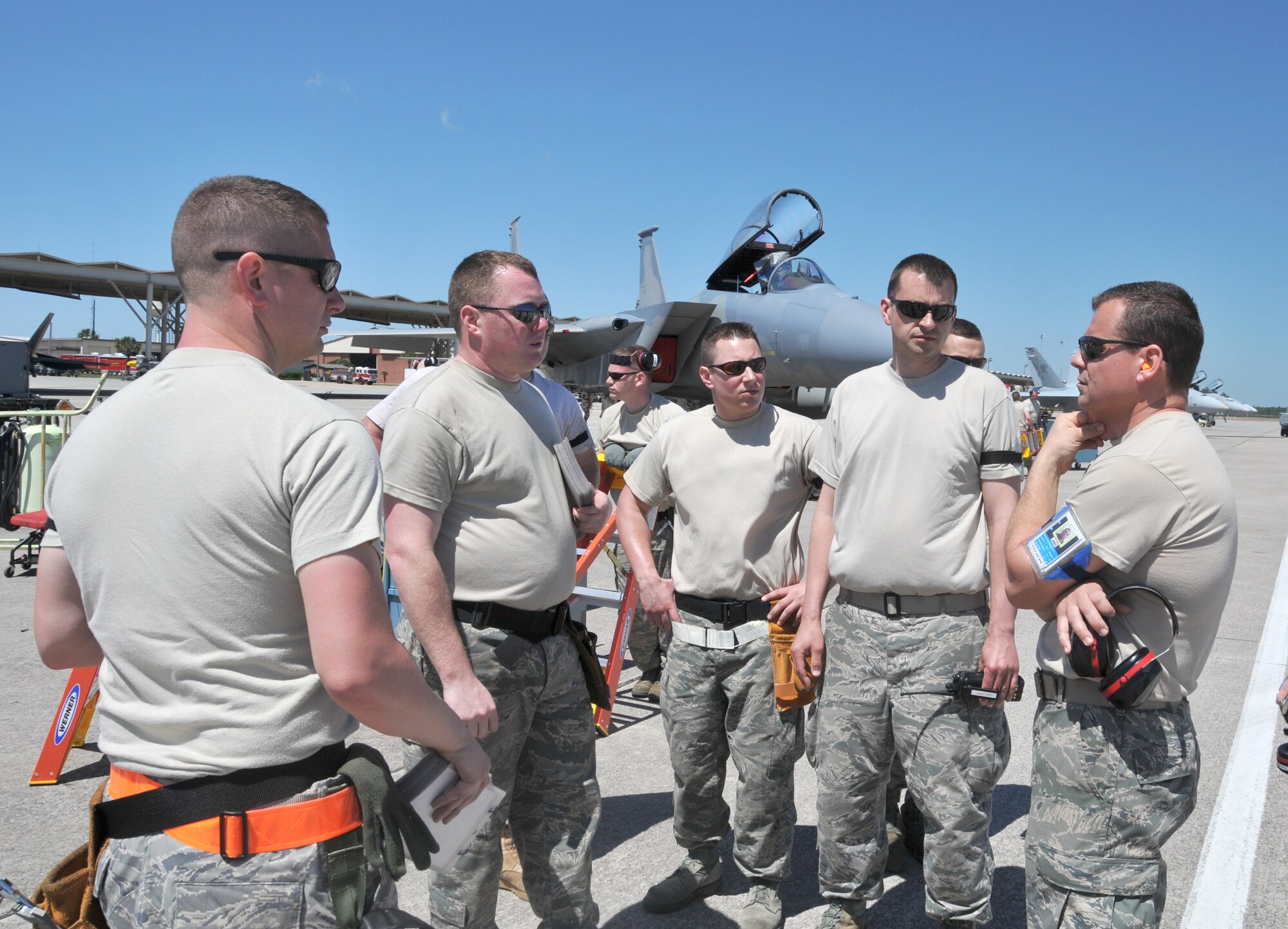 Chief Master Sergeant Robert Beaulieu, a weapons manager with the 104th Fighter Wing, Massachusetts Air National Guard, briefs his personnel before loading live missiles onto F-15 Eagles prior to live fire missions while deployed to Tyndall AFB Florida, in support of the Weapons System Evaluation Program (WSEP) on April 12, 2011. The two week training and evaluation program is important for ground crews to test their maintenance systems and processes while loading live munitions on F-15 Eagles, as well as critical live training for the F-15 pilots to employ air-to-air missiles against real world targets.