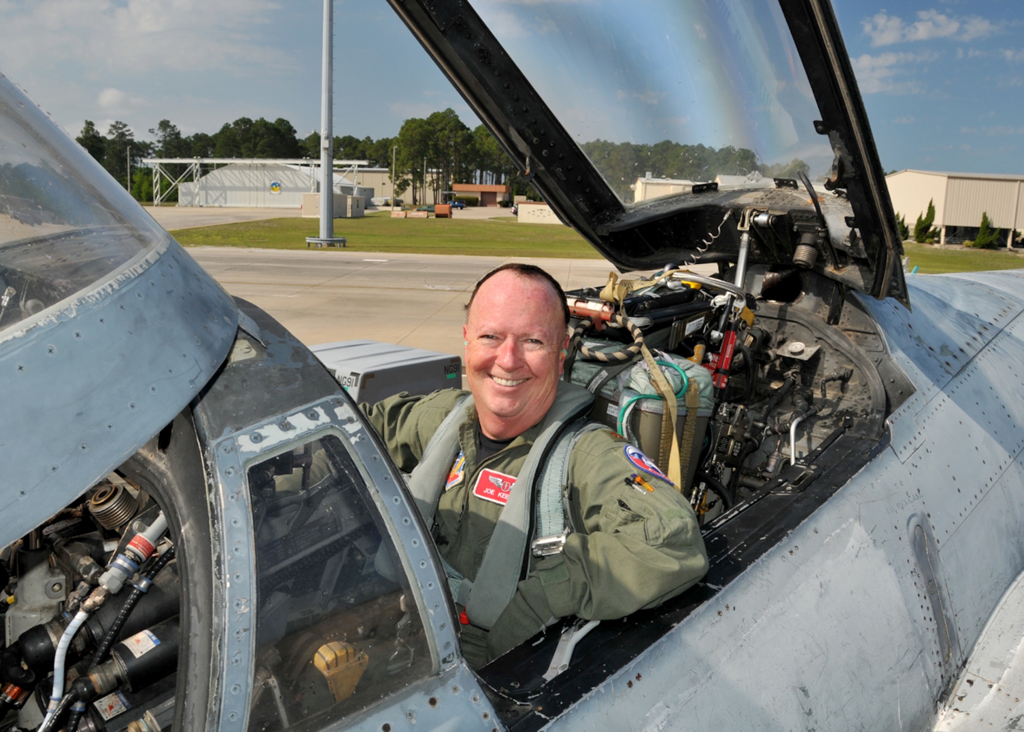 Major Joseph Keenan a flight surgeon with, the 104th Fighter Wing, Massachusetts Air National Guard shows his satisfaction following an incentive ride in an F-4 Phantom while deployed to Tyndall AFB Florida, in support of the Weapons System Evaluation Program (WSEP) on April 12, 2011. The two week training and evaluation program is important for ground crews to test their maintenance systems and processes while loading live munitions on F-15 Eagles, as well as critical live training for the F-15 pilots to employ air-to-air missiles against real world targets including unmanned F-4s.