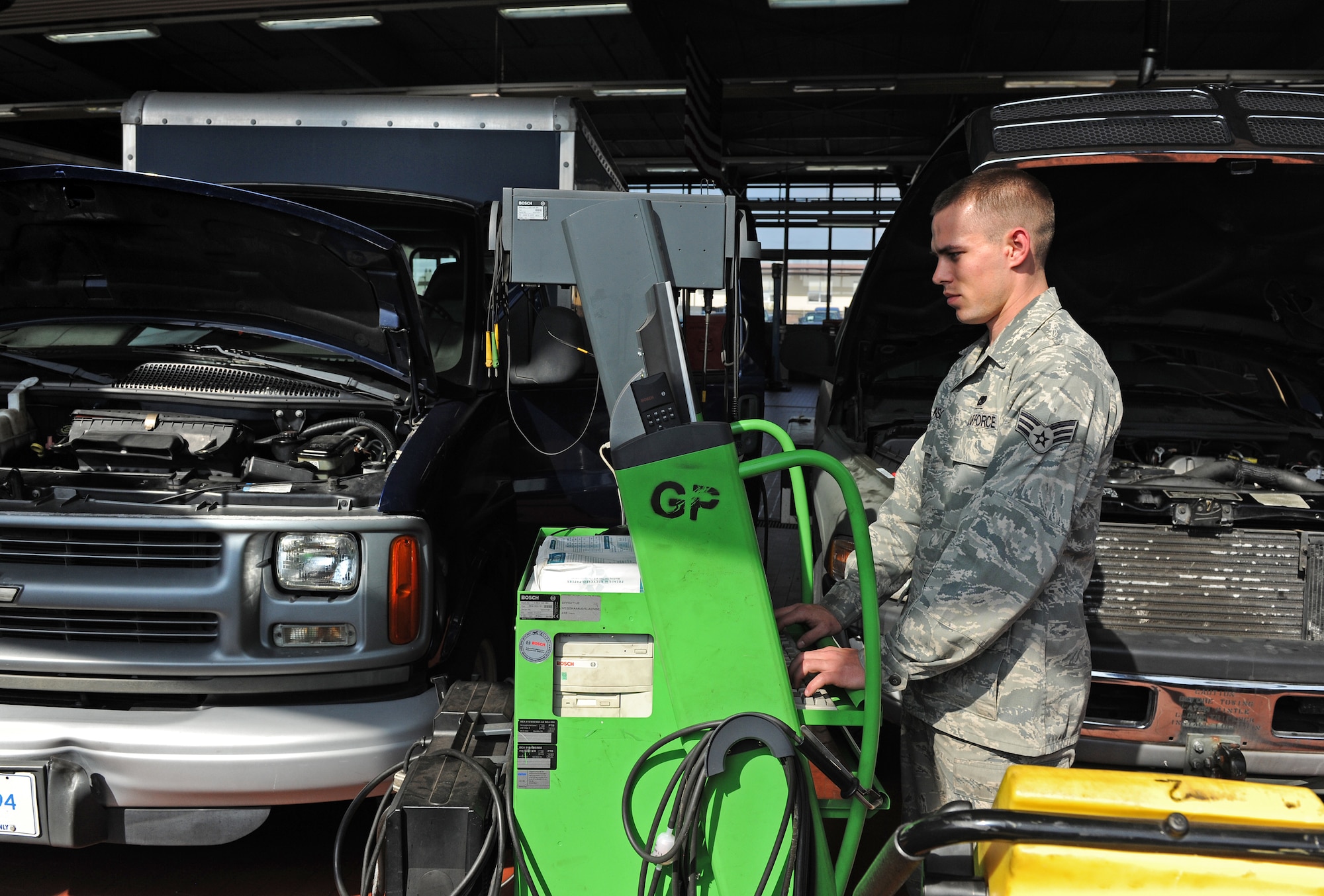 SPANGDAHLEM AIR BASE, Germany – Senior Airman Stephen Johnson, 52nd Logistics Readiness Squadron base vehicle maintenance technician, performs a computer diagnostics check on vehicles here April 6. The 52nd LRS vehicle Maintenance Flight is responsible for the maintenance and repair of all government-owned vehicles on base. (U.S. Air Force photo/Senior Airman Nathanael Callon)