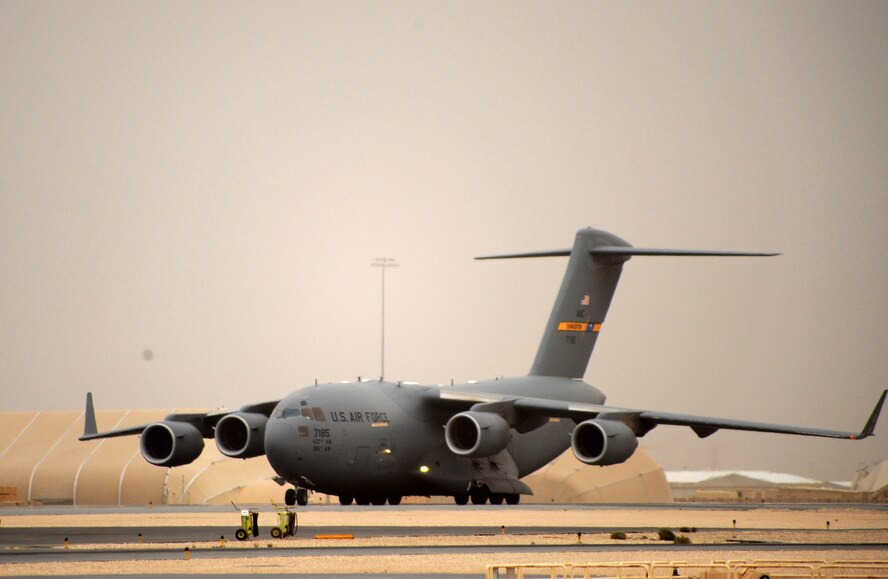 A C-17 Globemaster III taxis down the runway at an undisclosed location in Southwest Asia, April 12. The aircraft is capable of rapid strategic delivery of troops and all types of cargo to main operating bases or directly to forward bases in the area of responsbility. (U.S. Air Force photo/Staff Sgt. Liliana Moreno)        