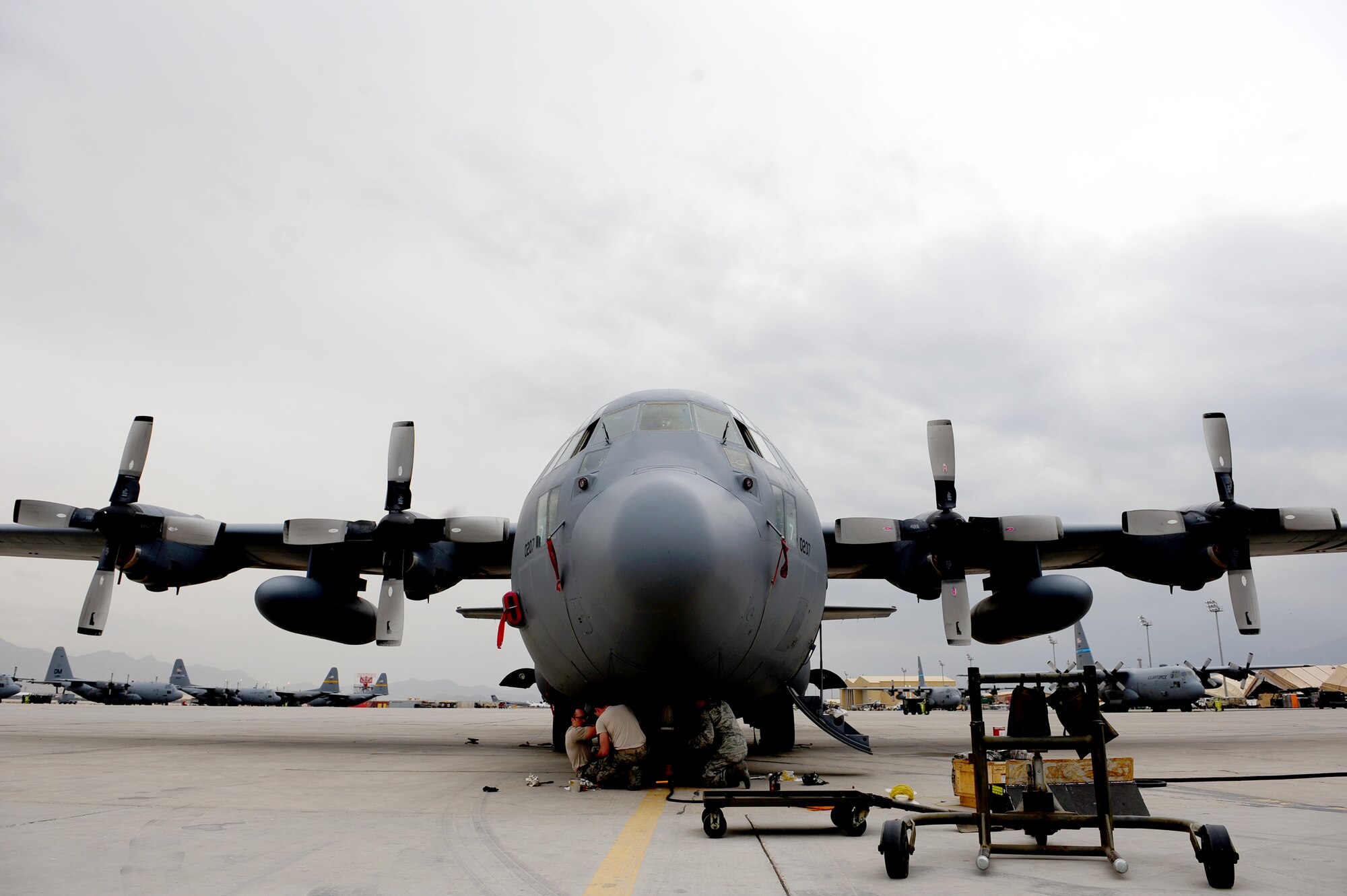 U.S. Air Force Master Sgt. Jeff Dillon, 455th Expeditionary Aircraft Maintenance Squadron crew chief, fills out the repair log after changing out the front tires for a C-130 Hercules aircraft at Bagram Airfield, Afghanistan, April 9, 2011. Dillon is deployed from the Delaware Air National Guard’s 166th Aircraft Maintenance Squadron, New Castle, Del., supporting Operation Enduring Freedom. (U.S. Air Force photo/Master Sgt. William Greer)