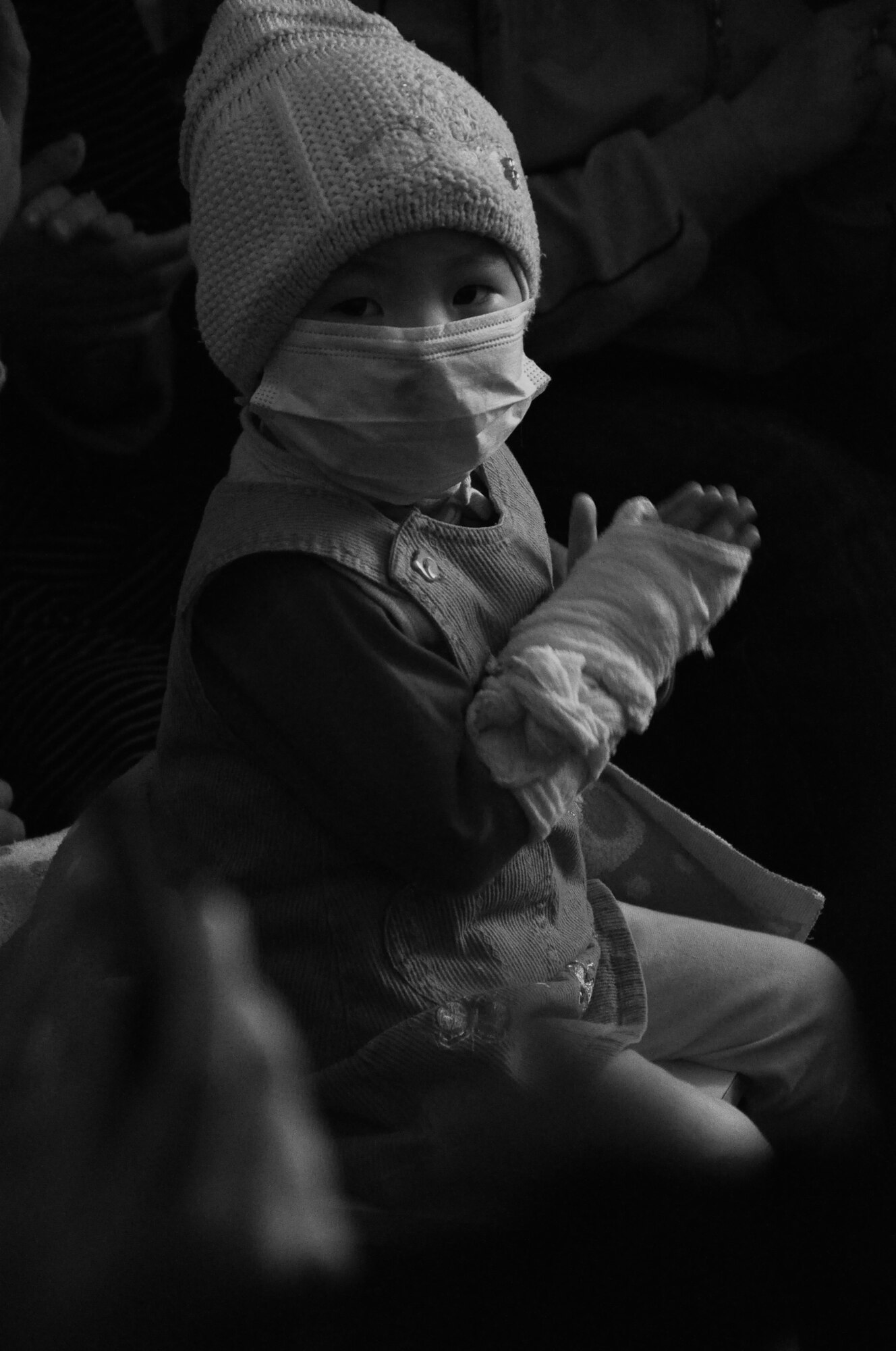 3-year old patient with leukemia from the Children's Cancer Center in Bishkek, Kyrgyzstan claps along to AFCENT Band Wild Blue Country's selections just after her chemotherapy treatment. (U.S. Air Force photo by Master Sgt. Daniel Nathaniel III)
