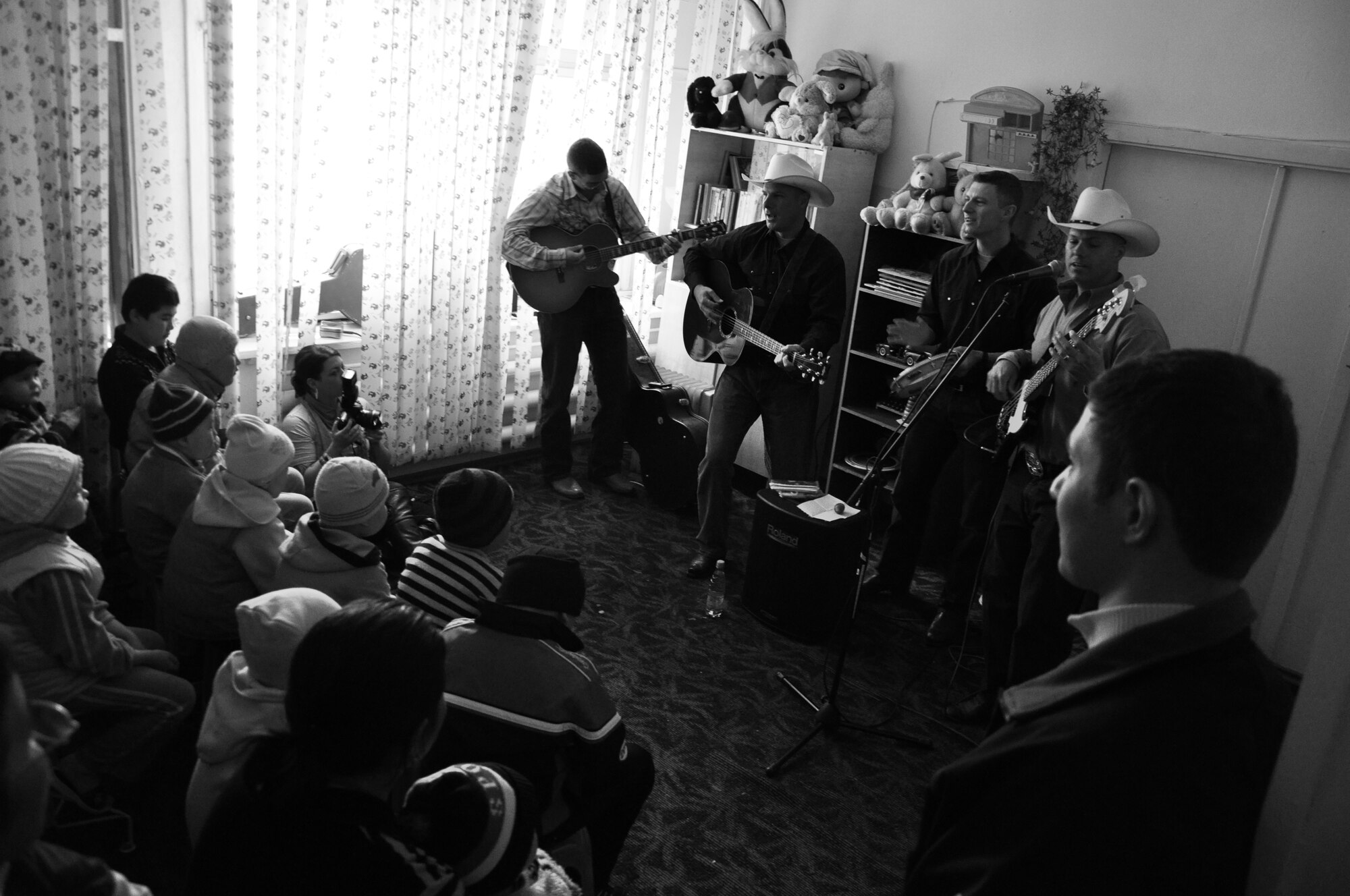 AFCENT Band Wild Blue Country performs for patients at the Children's Cancer Center in Bishkek, Kyrgyzstan. (U.S. Air Force photo by Master Sgt. Daniel Nathaniel III)