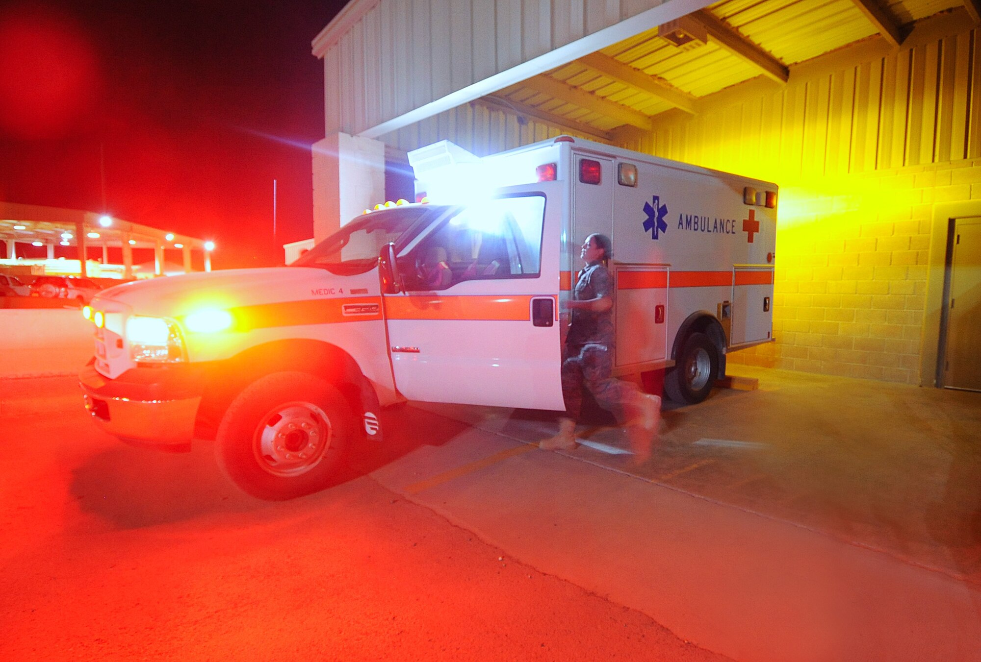 During shift change, 386th Expeditionary Medical Group personnel are required to perform function checks on all equipment, to include everything on the ambulance. Some items that are included in the check are the lights, siren, oxygen and radio equiment. (U.S. Air Force photo by Senior Airman Cynthia Spalding)