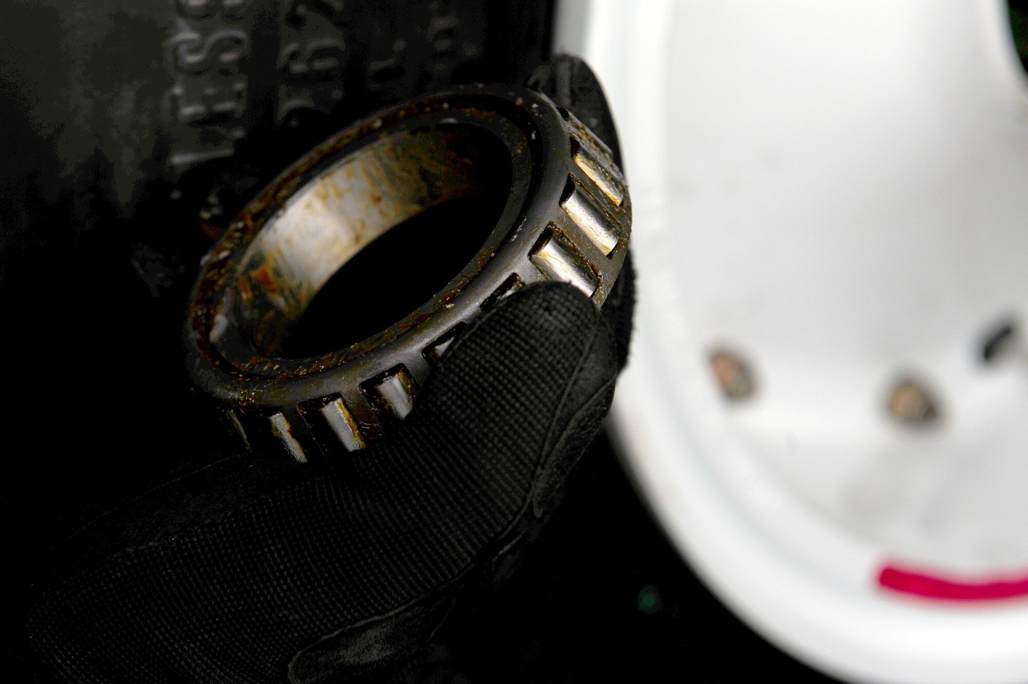 U.S. Air Force Staff Sgt. John Green, 455th Expeditionary Aircraft Maintenance Squadron crew chief, prepares a new wheel bearing to be installed during a tire change procedure on a C-130 Hercules aircraft at Bagram Airfield, Afghanistan, April 9, 2011. Green is deployed from the Delaware Air National Guard’s 166th Aircraft Maintenance Squadron, New Castle, Del., supporting Operation Enduring Freedom. (U.S. Air Force photo/Master Sgt. William Greer)