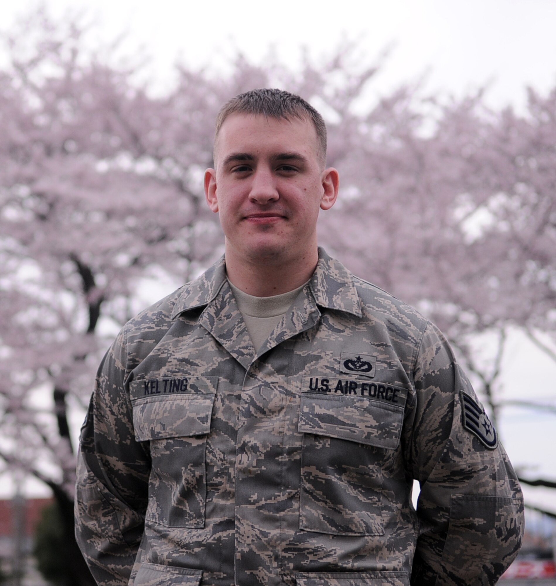 YOKOTA AIR BASE, Japan -- Staff Sgt. Bruce Kelting, 773rd Civil Engineer Squadron operation manager Elmendorf Air Force Base, Alaska, poses for a photo at Yokota Air Base, Japan April 8, 2011. "This is important because it allows the different agencies around the base to communicate and work together to help the country of Japan recover from this disaster", says Sergeant Kelting. A native of Yakima, Wash., Sergeant Kelting has been working along with his fellow Airmen in support of Operation Tomodachi. (U.S. Air Force photo/Airman 1st Class Krystal M. Garrett) 