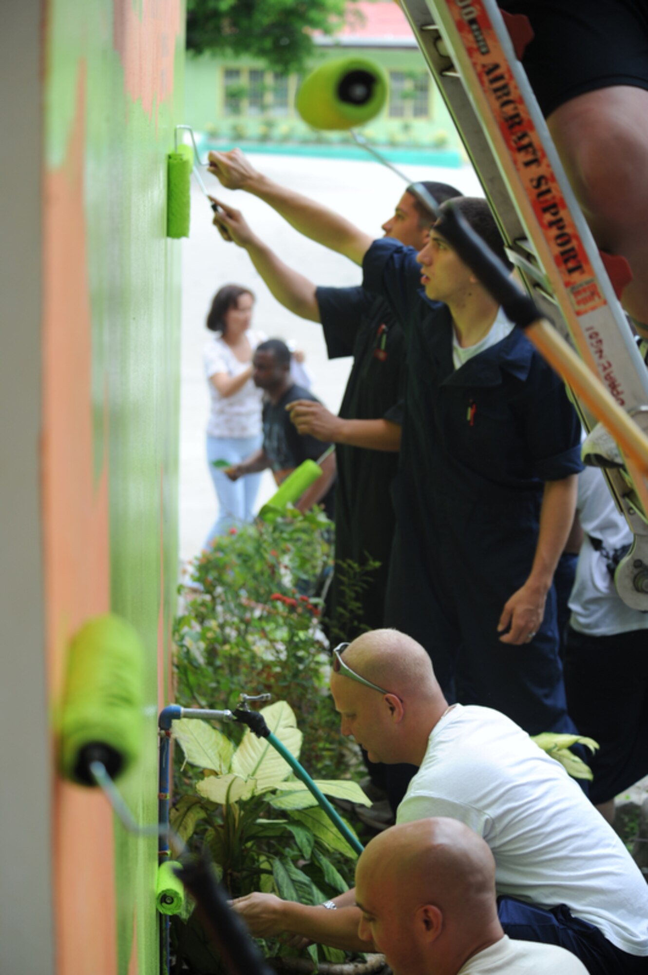 ANGELES CITY, Philippines - U.S. Airmen participating in in Exercise
Balikatan 2011 take time to paint the Sapang Bato Elementary School located
in Angeles City Philippines on April 9. 

Balikatan means "shoulder to shoulder in Tagalog and is an annual Republic
of the Philippines and United States bilateral military humanitarian
assistance and training exercise that will take place in the Philippines
April 5-15. The training helps maintain readiness and sustain the long-term
security assistance relationship shared between the two countries.  (U.S.
Air Force photo/Master Sgt. Cohen A. Young)