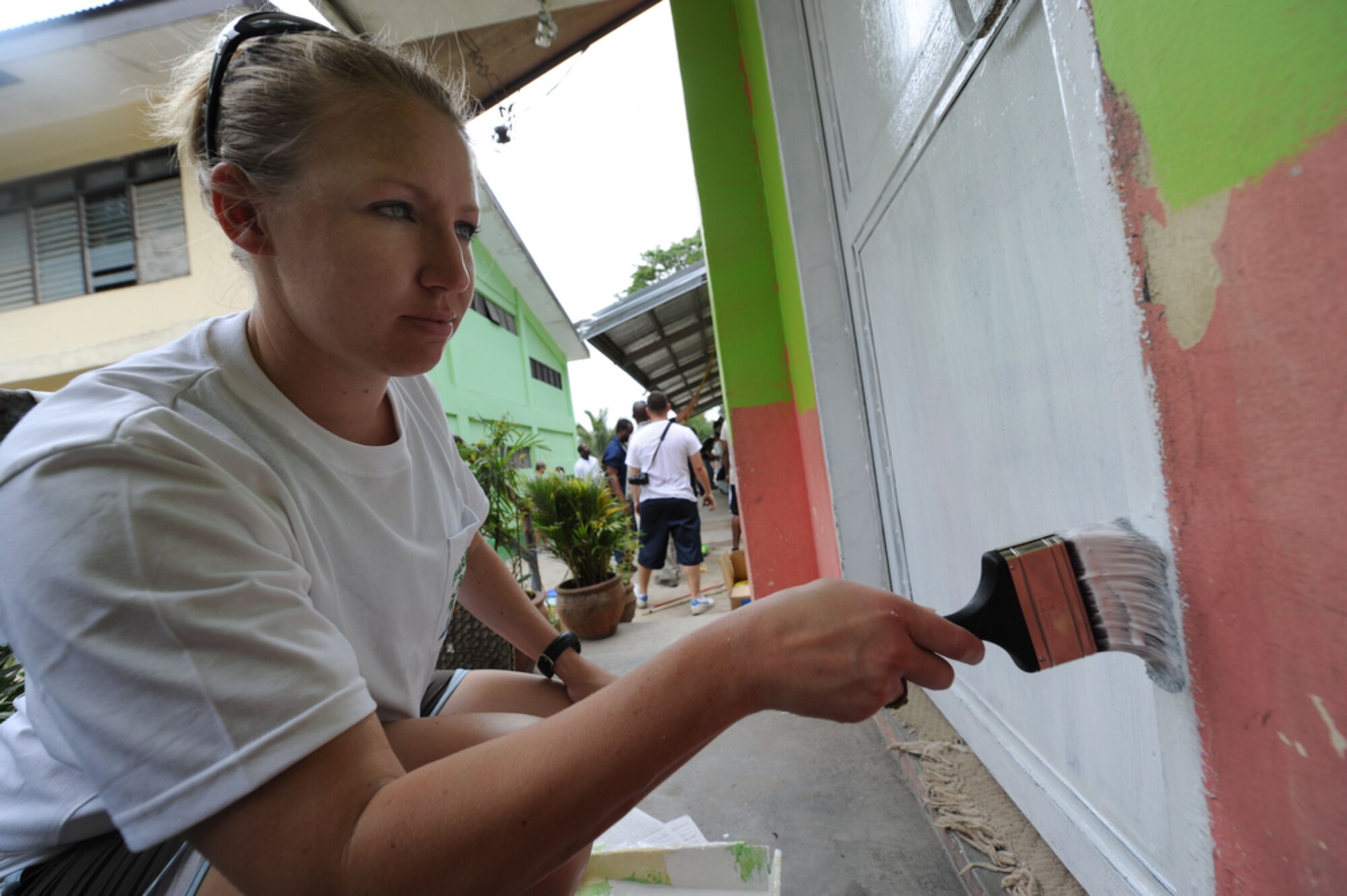SAPANG BATO, Angeles City, Philippines - 25th Fighter Squadron pilot Capt.
Kelly Nettleblad, a native of Longmont, Colo., touches up the door of a
school building while she and other Airmen paint the Sapang Bato Elementary
School located in Angeles City Philippines on April 9. The Airmen pulled
their own money together in order to buy painting supplies and then took a
break from Balikatan 2011 to volunteer and spread good will to the Sapang
Bato community.

Balikatan is a regularly scheduled exercise focusing on interoperability of
forces and training and assistance in humanitarian and civic assistance
operations. The experience gained in Balikatan complements our security
assistance program and will improve upon existing AFP counter-terrorism
programs.  (U.S.  Air Force photo/Master Sgt. Cohen A. Young)
