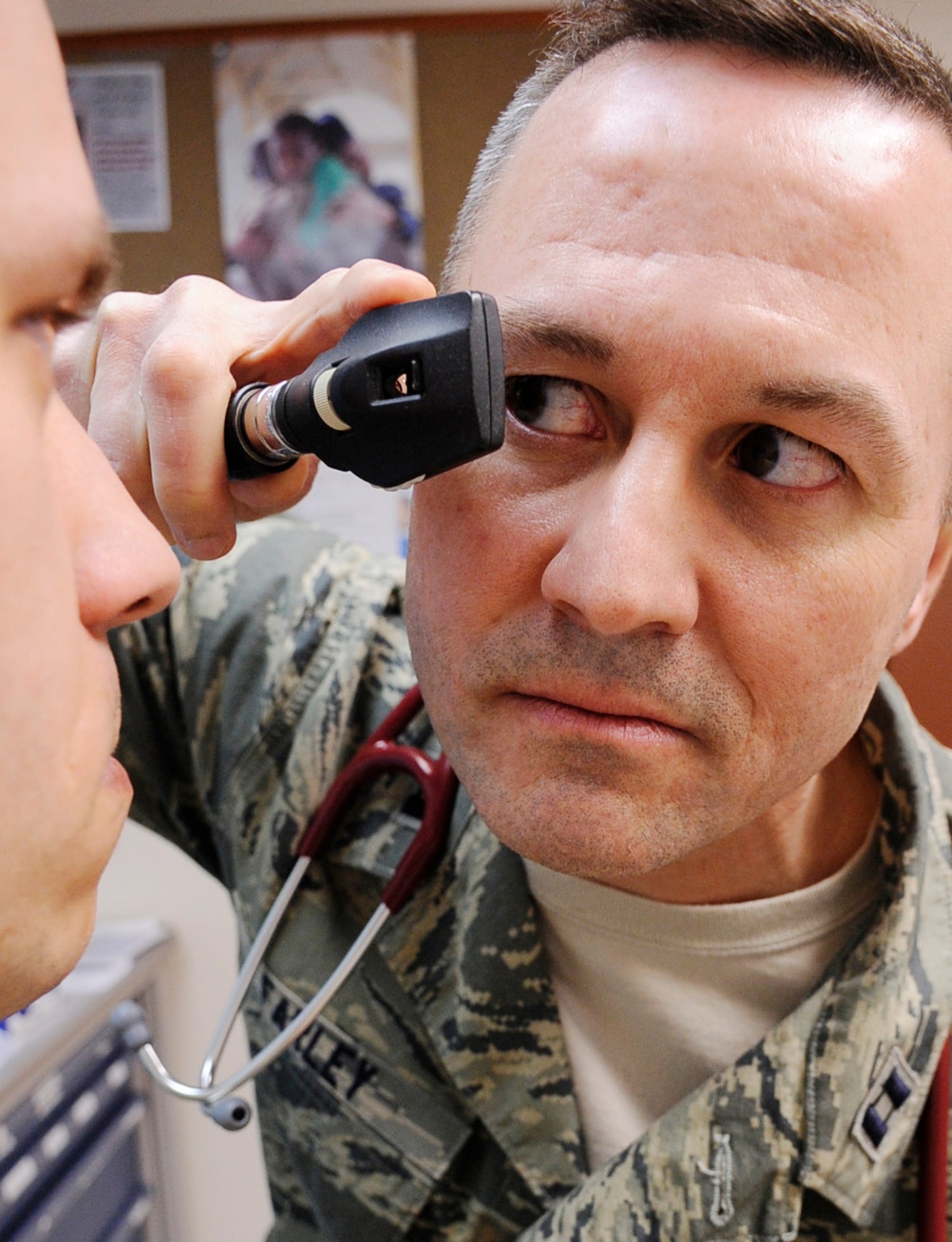 Capt. Jon Farley performs a check-up on a patient April 11, 2011, Eielson Air Force Base, Alaska. Captain Farley is a physician's assistant assigned to the 354th Medical Operations Squadron. (U.S. Air Force photo/Airman 1st Class Laura Goodgame) 