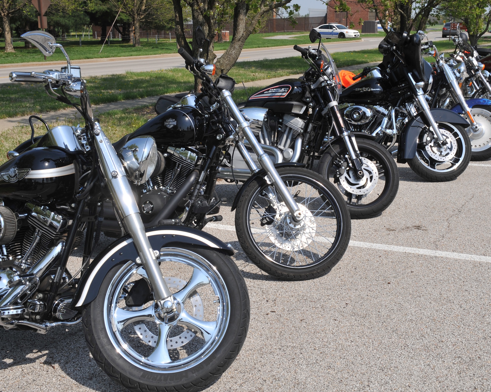 Cruisers line up during the Motorcycle Safety Day at Scott Air Force Base, Ill., April 14, 2011. The cruisers preformed in their own competition to see who would come in first, in the end retired Chief Master Sgt. Bill Poole came in first place with his cruiser and Best of Show went to Ray Forcier with his cruiser. (U.S. Air Force photo/Senior Airman Tristin English)