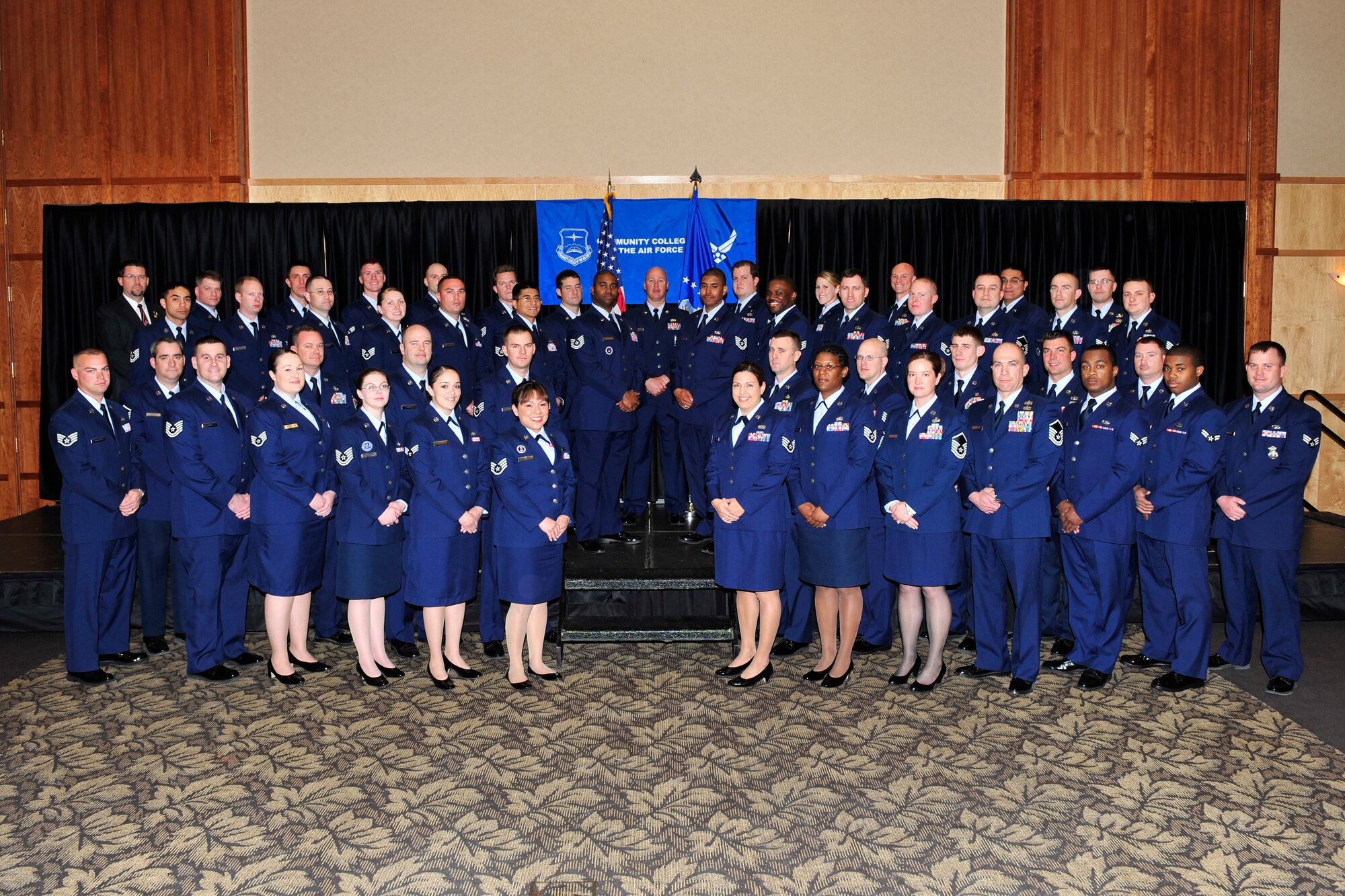 Those present for the Community College of the Air Force Spring 2011 Graduation ceremony gather for a group photo at Club Hill April 12. Of a class of 125, 49 were able to attend the ceremony and participate in the photo. (U.S. Air Force photo by Kim Cook)