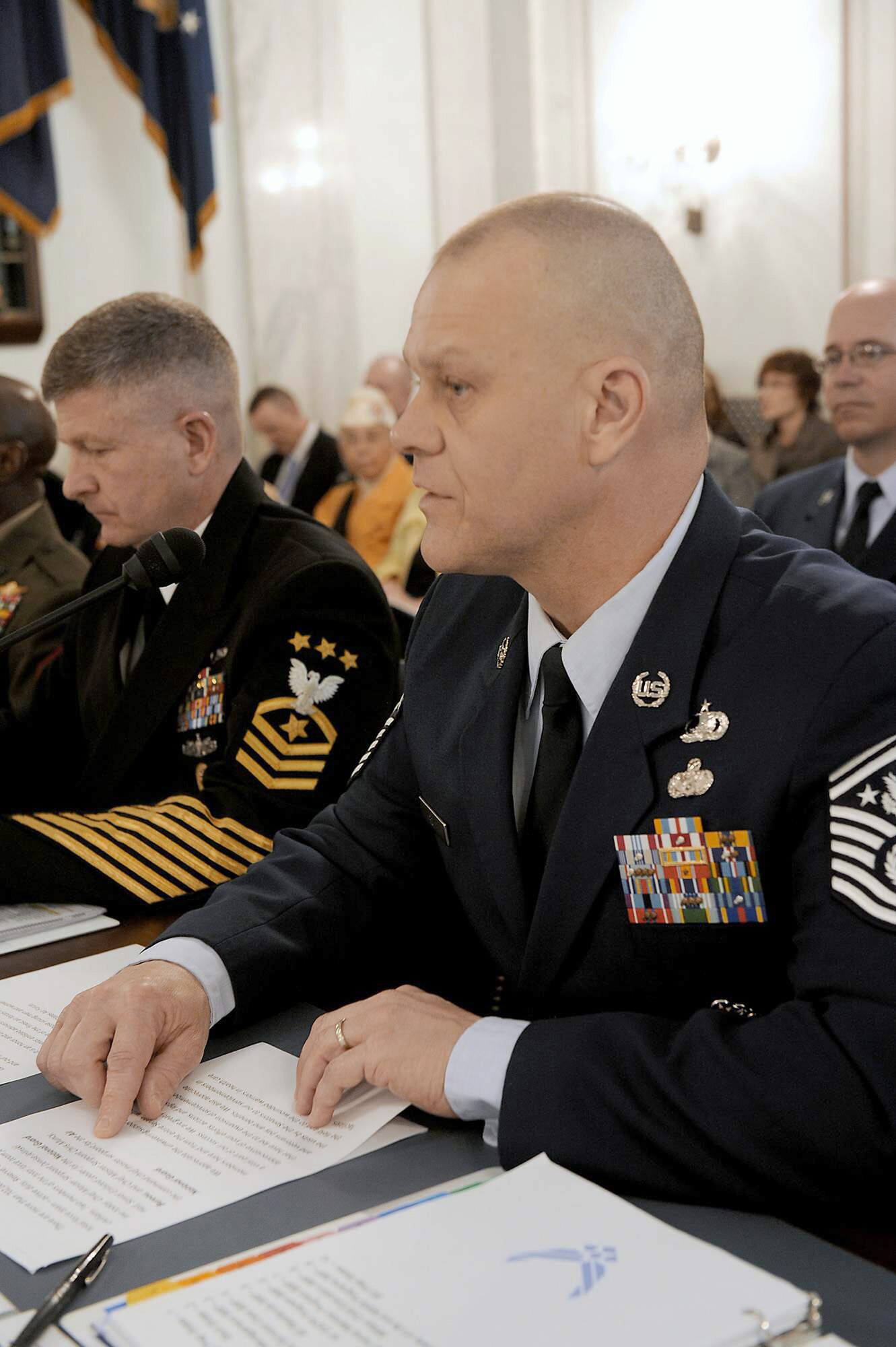 Chief Master Sgt. of the Air Force James A. Roy (right) gives his opening statement during a Senate Armed Services subcommittee hearing on military personnel issues April 13, 2011, in Washington. Seated next to Chief Roy is Master Chief Petty Officer of the Navy Rick West, and both were joined on the panel by Sgt. Maj. of the Army Raymond Chandler III and Sgt. Maj. of the Marine Corps Carlton Kent. (U.S. Air Force photo/Scott M. Ash)