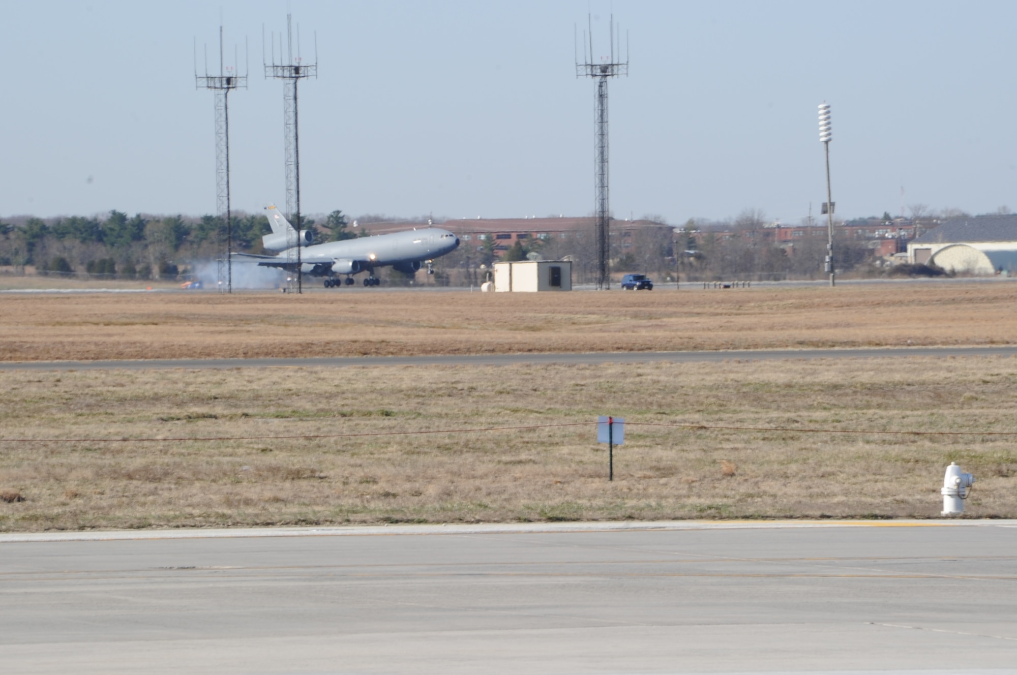 A formation of KC-10 Extenders touched down at Joint Base McGuire-Dix-Lakehurst concluding exercise NEPTUNE FALCON March 29. The 305th and 514th Air Mobility Wings joined servicemembers from an array of wings and specialties to practice and improve large-formation global reach efforts in the exercise. The KC-10 Extender provided aerial refueling during a multi-aircraft large-formation refueling mission held at Travis Air Force Base, Calif. (U.S. Air Force photo by Airmen 1st Class Dennis Sloan/Released) 