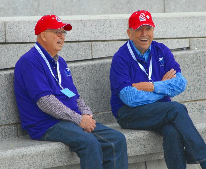 DYESS AIR FORCE BASE, Texas - Two World War II veterans talk about old times while visiting the World War II Memorial in Washington D.C. April 12 as part of a West Texas Honor Flight Network event. The Honor Flight Network is a non-profit organization created to honor America’s veterans for their sacrifices by transporting these heroes to Washington D.C. to visit and reflect at their memorials at no cost to themselves. Honor Flight trips are made possible through donations; discounts by charter bus companies, airlines, hotels and more; and through volunteers, of which more than 100 were present during this West Texas Honor Flight. (Air Force photo/Tech. Sgt. Robert Wollenberg)