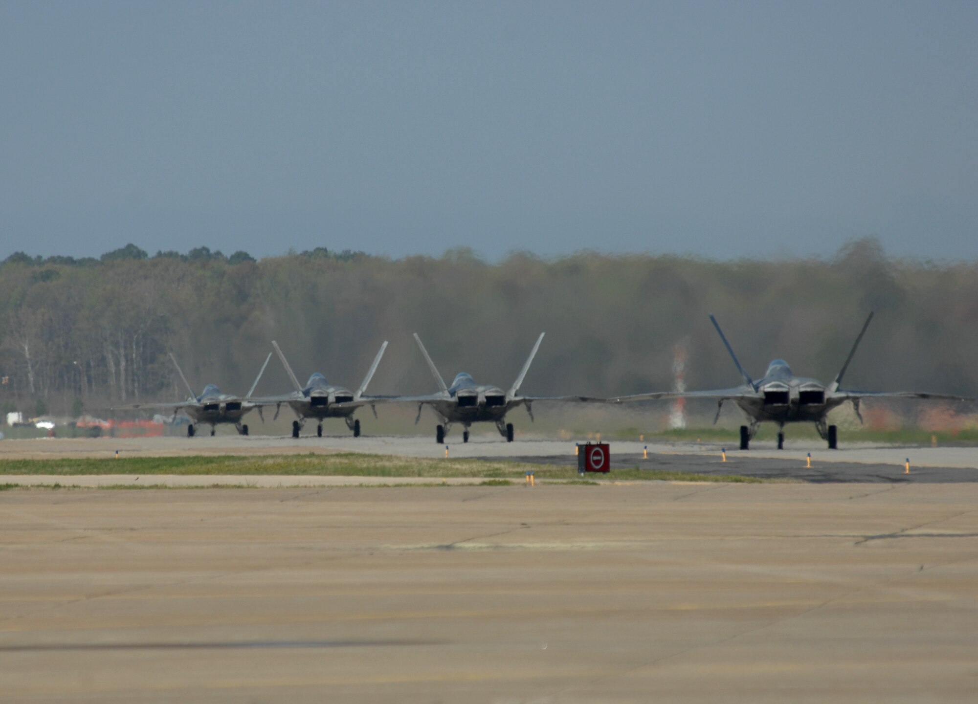 F-22 Raptors taxi April 10, 2011, during an operational readiness inspection at Langley Air Force Base, Va. (U.S. Air Force photo/Airman 1st Class Teresa Zimmerman) 