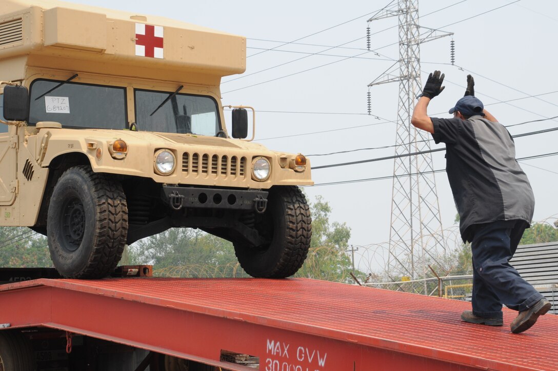 SOTO CANO AIR BASE, Honduras – Joint Task Force-Bravo receives a new M997 Tactical Ambulance here, April 14. The ambulance is part of the JTF-B Tactical Wheeled Vehicle Life Cycle Management Plan. A total of 69 replacement vehicles began arriving here in November 2010, and deliveries will continue through October 2011. JTF-B maintains the highest levels of proficiency and readiness to provide support capabilities for any mission, emergency or crisis (U.S. Air Force photo/Staff Sgt. Kimberly Rae Moore)