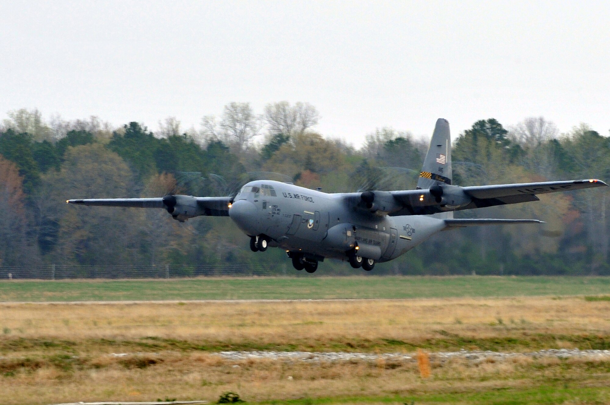 A C-130 takes off from the base runway March 25, 2011, at Little Rock Air Force Base, Ark. The base provides the largest C-130 transport fleet in the world, supplying humanitarian airlift relief to victims of disasters, to airdropping supplies and troops into the heart of contingency operations in hostile areas.  (U.S. Air Force photo by Airman 1st Class Rusty Frank)