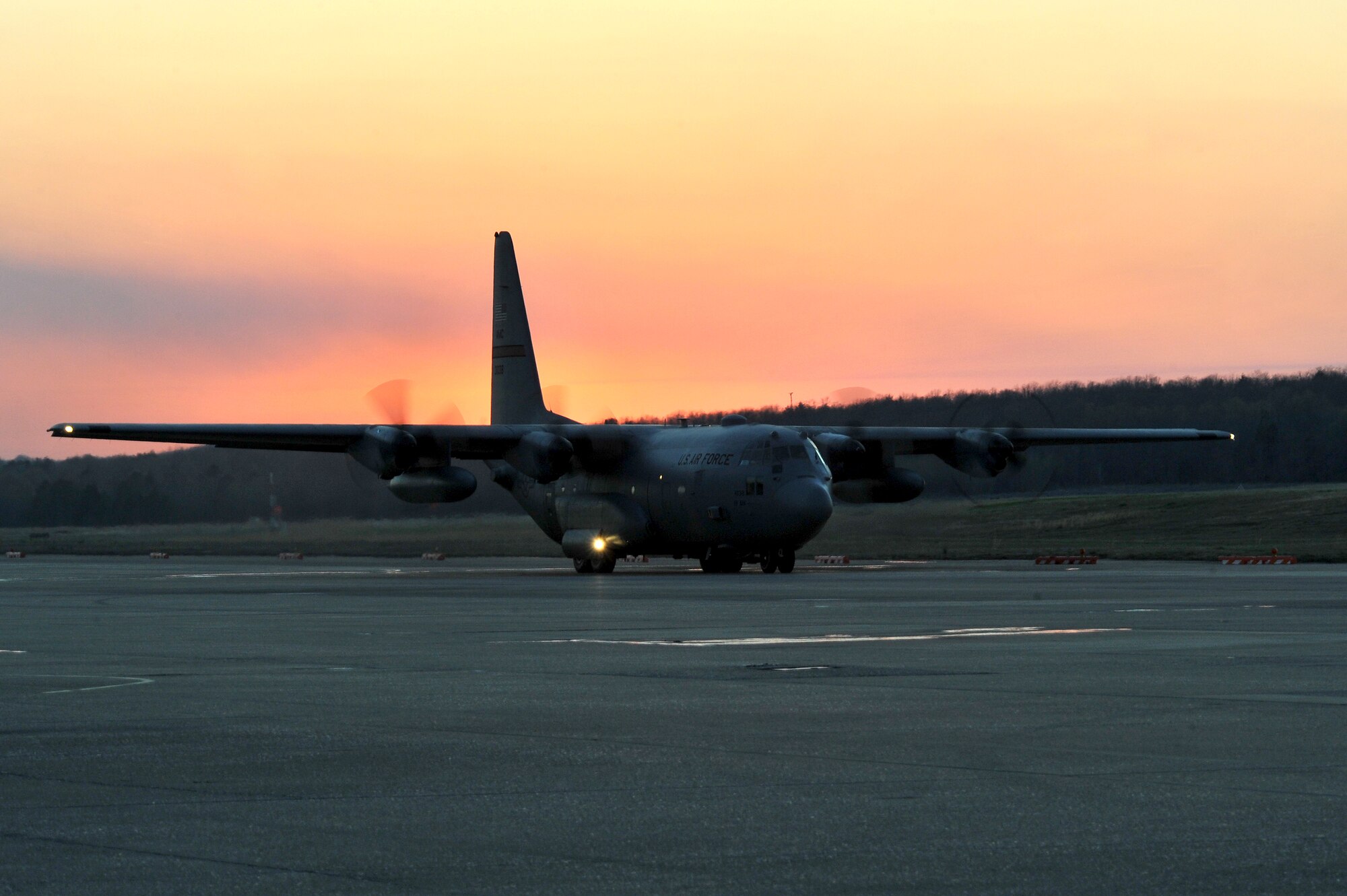 A C-130 takes off from the base runway March 24, 2011, at Little Rock Air Force Base, Ark. The base provides the largest C-130 transport fleet in the world, supplying humanitarian airlift relief to victims of disasters, to airdropping supplies and troops into the heart of contingency operations in hostile areas. (U.S. Air Force photo by Staff Sgt. Chris Willis)