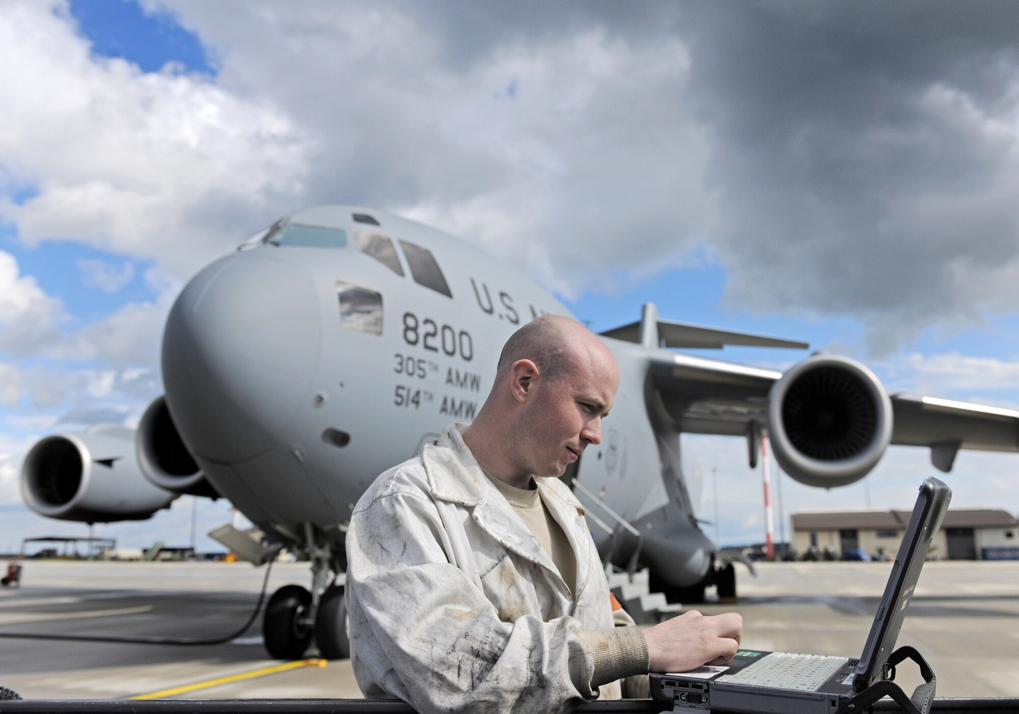 Staff Sgt. Sean Durkin reviews a technical order prior to inspecting the engines of a C-17 Globemaster III April 12, 2011, at Spangdahlem Air Base, Germany. Sergeant Durkin is an aircraft hydraulics journeyman assigned to the726th Air Mobility Squadron. (U.S. Air Force photo/Senior Airman Nathanael Callon)