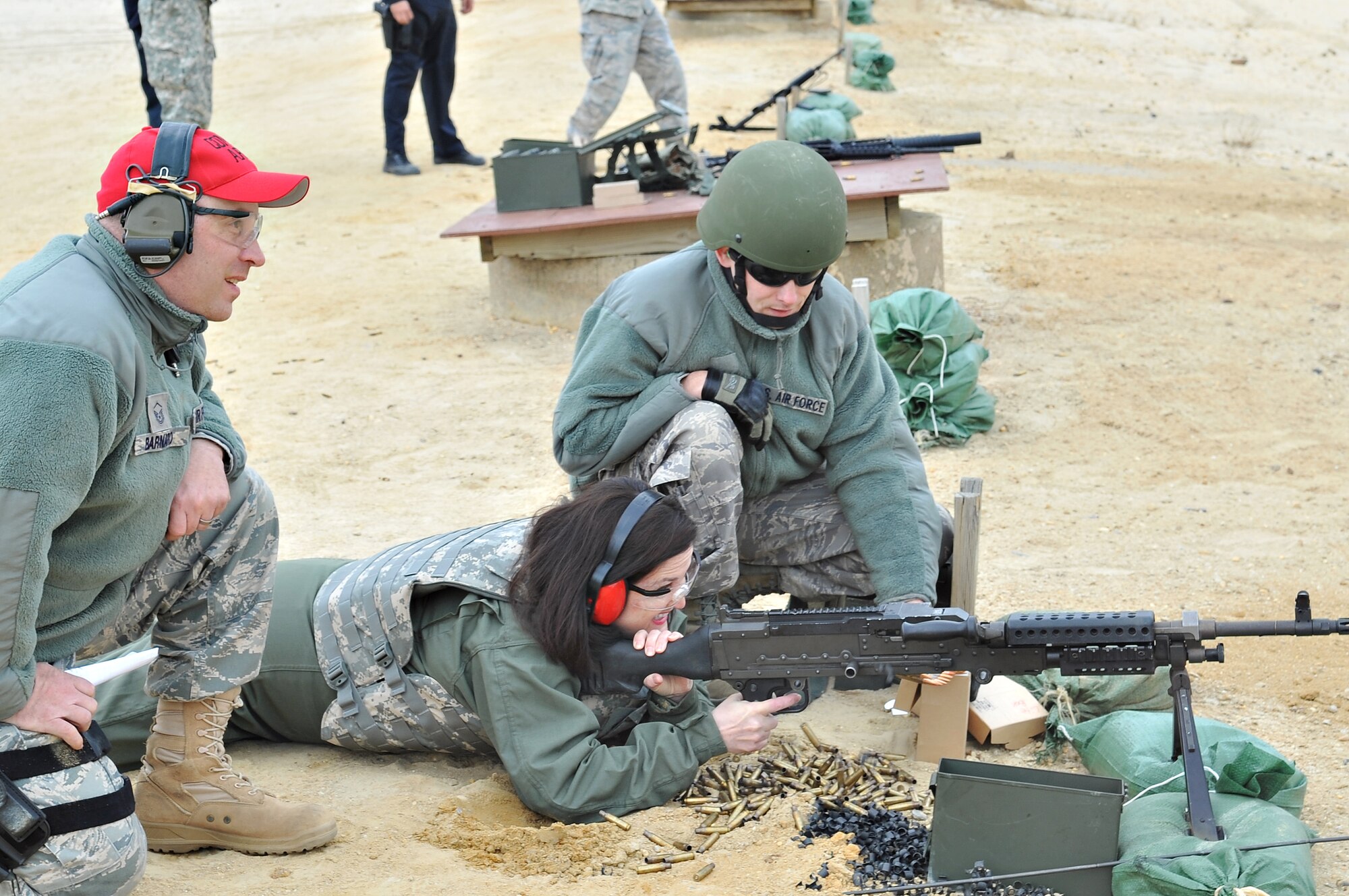 The Honorable Katherine Hammack, Assistant Secretary of the Army for Installations, Energy and Environment, is given a small-arms orientation by the 87th Security Forces Squadron during a tour of Joint Base McGuire-Dix-Lakehurst April 7. (U.S. Air Force photo by Wayne Russell/Released)