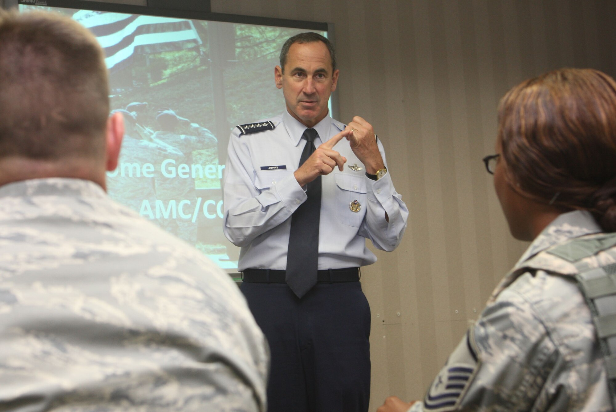 Gen. Ray Johns, Commander of the Air Mobility Command visits with members of the 94th Security Forces Squadron, during his tour of Dobbins Air Reserve Base, Ga., Apr 11. (U.S. Air Force Photo/Don Peek)