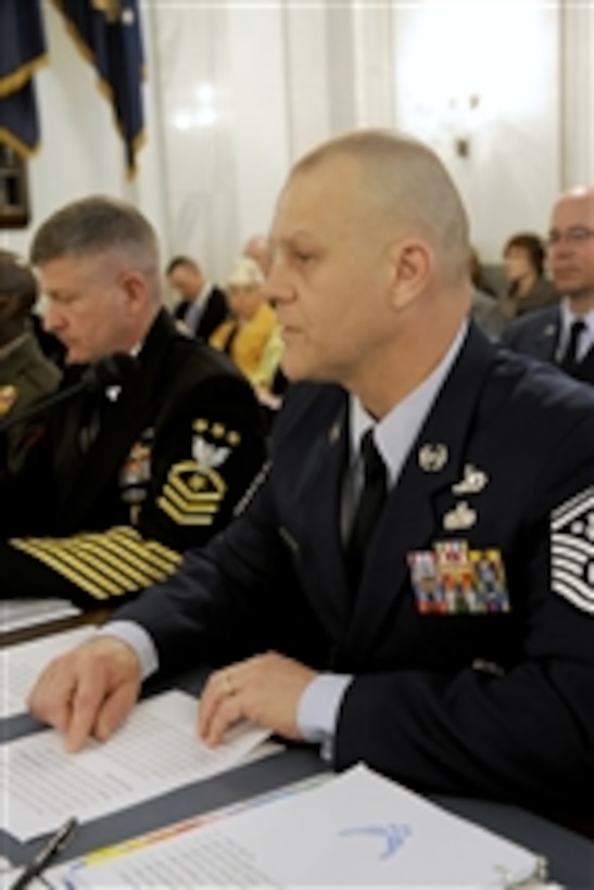 Chief Master Sergeant of the Air Force James Roy (right) gives his opening statement during a Senate Armed Services subcommittee hearing on military personnel issues in Washington, D.C., on April 13, 2011.  Next to Roy is Master Chief Petty Officer of the Navy Rick West.  Both Roy and West were joined on the panel by Sergeant Major of the Army Raymond Chandler III and Sergeant Major of the Marine Corps Carlton Kent.  