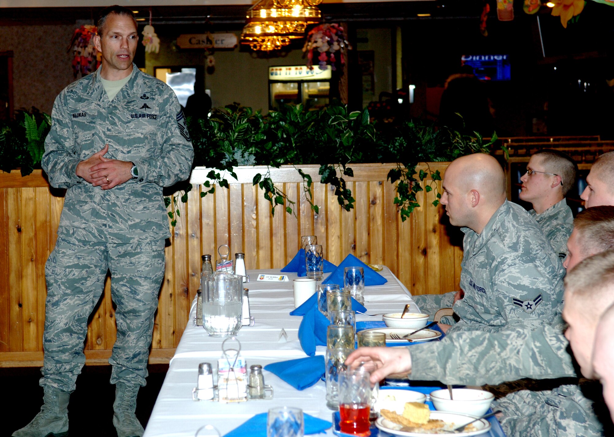Chief Master Sgt. Martin Klukas, Air Combat Command command chief, shares a story with Airmen at the Bandit Inn dining facility at Ellsworth Air Force Base, S.D., April 14, 2011. The story was about his time in U.S. Army Ranger School that taught Airmen to always pursue their dreams and never lose sight of their goals. (U.S. Air Force photo by Senior Airman Jarad A. Denton)