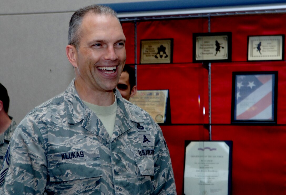Chief Master Sgt. Martin Klukas, Air Combat Command command chief, tours the 34th Bomb Squadron at Ellsworth Air Force Base, S.D., April 14, 2011. During his visit he said he was constantly impressed with the professionalism and dedication of Ellsworth’s Airmen. (U.S. Air Force photo by Senior Airman Jarad A. Denton)