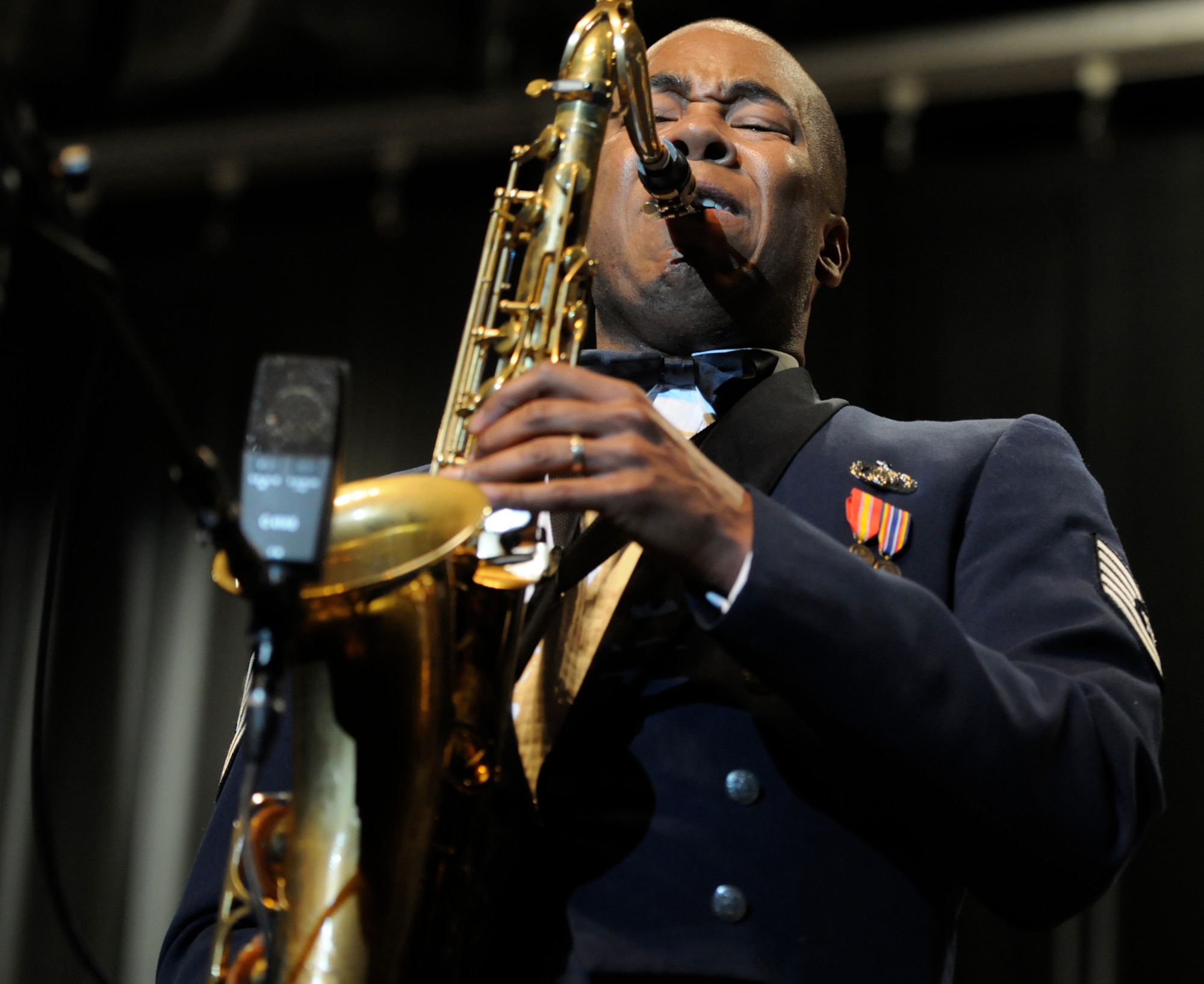 Tech. Sgt. Grant M. Langford performs a solo March 15, 2011, at Robert E. Lee High School in Staunton, Va. This performance was the first on the Air Force Band Airmen of Note's 2011 spring tour. Sergeant Langford is a tenor saxophonist with the Airmen of Note. (U.S. Air Force photo/Airman 1st Class Tabitha N. Haynes)
