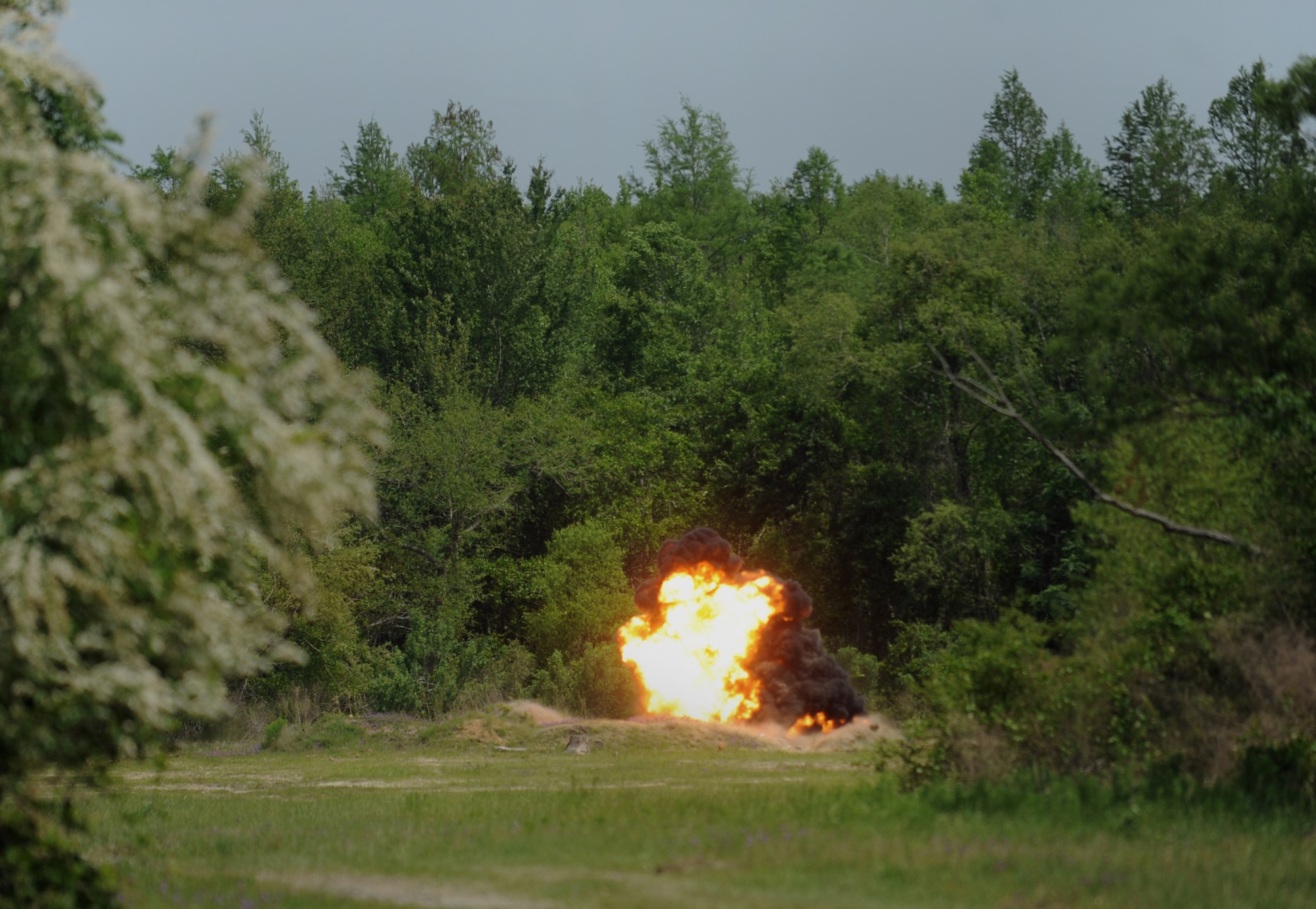 Two blocks of M-112 explosives detonate to dispose of two M-18 smoke grenades at Moody Air Force Base, Ga., April 15. The two M-18 smoke grenades needed to be disposed of because they failed to function properly. (U.S. Air Force photo/Airman 1st Class Douglas Ellis)(RELEASED)
