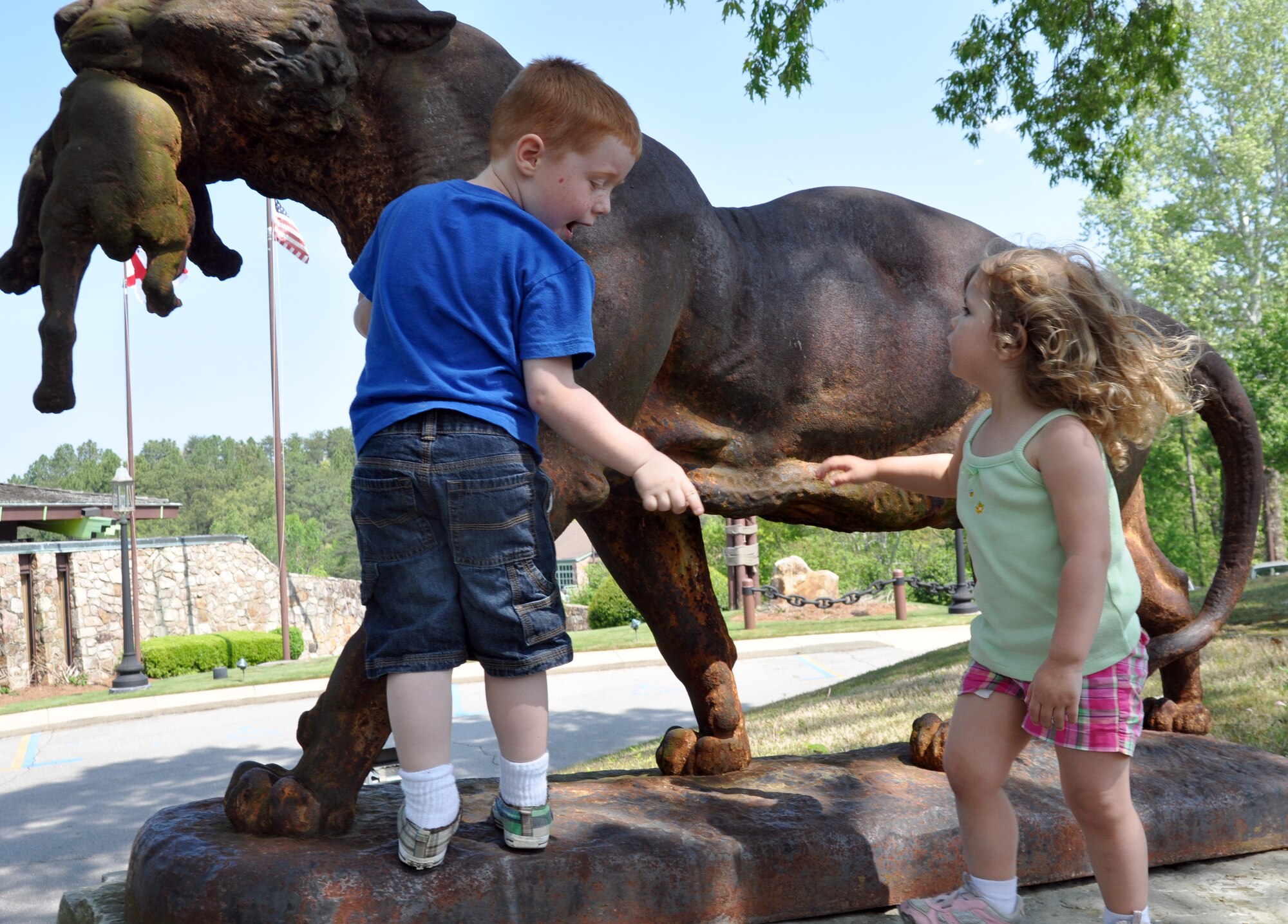 Adam Hardin and Gianna Muscarella explore a statue during an excursion for children attending the reintegration and marriage retreat with their parents April 9. Adam is the son of Kelli Hardin, 14th Contracting Squadron, and Gianna is the daughter of Carmine Muscarella, AFRC. (U.S. Air Force photo/Staff Sgt. Jacob Corbin)