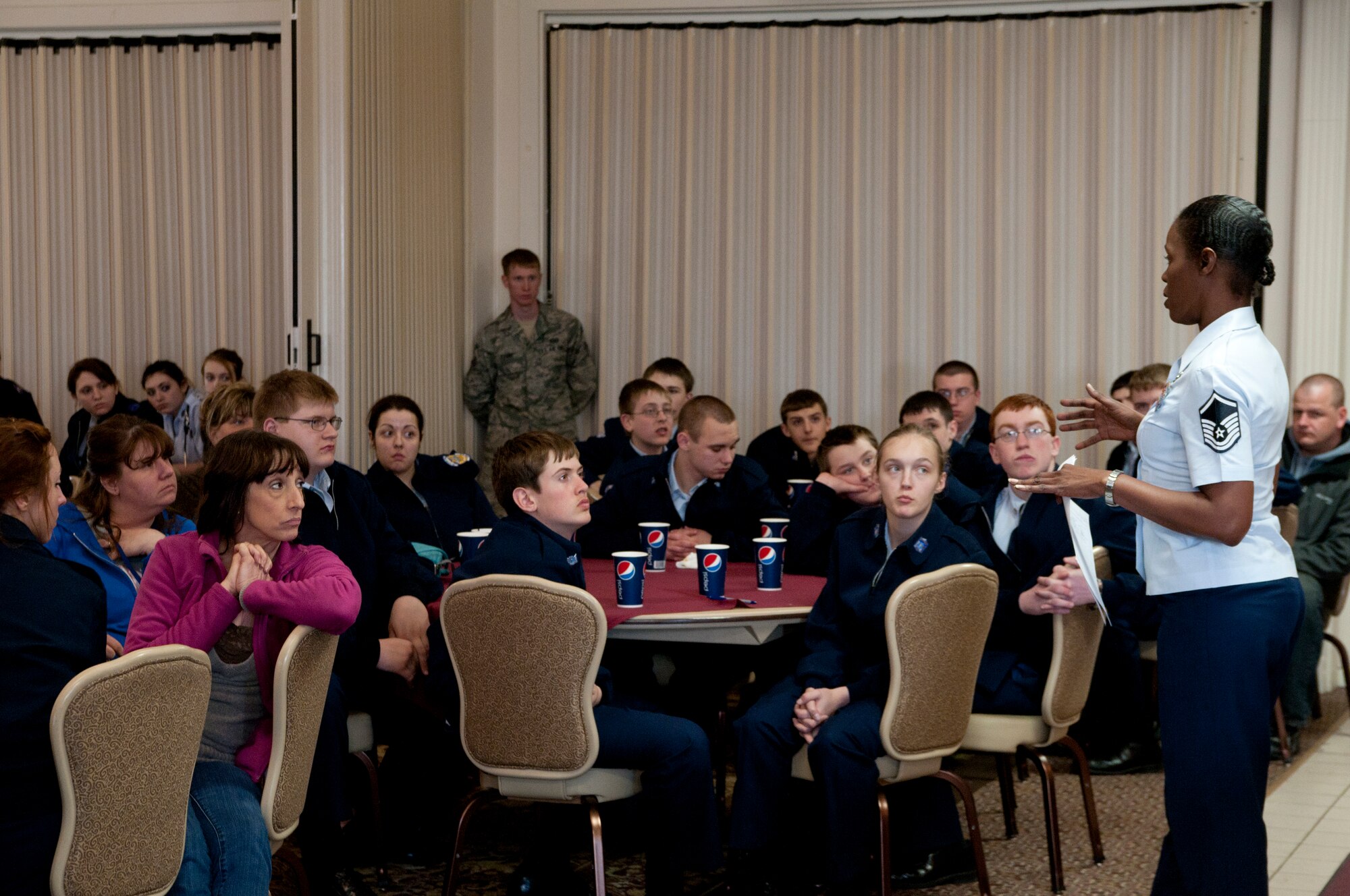YOUNGSTOWN AIR RESERVE STATION, Ohio — Master Sgt. Patricia Flowers, an Air Force Reserve recruiter, briefs a group of Air Force Junior Reserve Officer Training Corps (AFJROTC) members on Air Force Reserve opportunities. Approximately 75 junior ROTC members from Midview High School's AFJROTC Program attended a base tour and orientation flight Wednesday. U.S. Air Force photo by Mr. Eric M. White.
