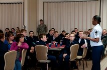 YOUNGSTOWN AIR RESERVE STATION, Ohio — Master Sgt. Patricia Flowers, an Air Force Reserve recruiter, briefs a group of Air Force Junior Reserve Officer Training Corps (AFJROTC) members on Air Force Reserve opportunities. Approximately 75 junior ROTC members from Midview High School's AFJROTC Program attended a base tour and orientation flight Wednesday. U.S. Air Force photo by Mr. Eric M. White.
