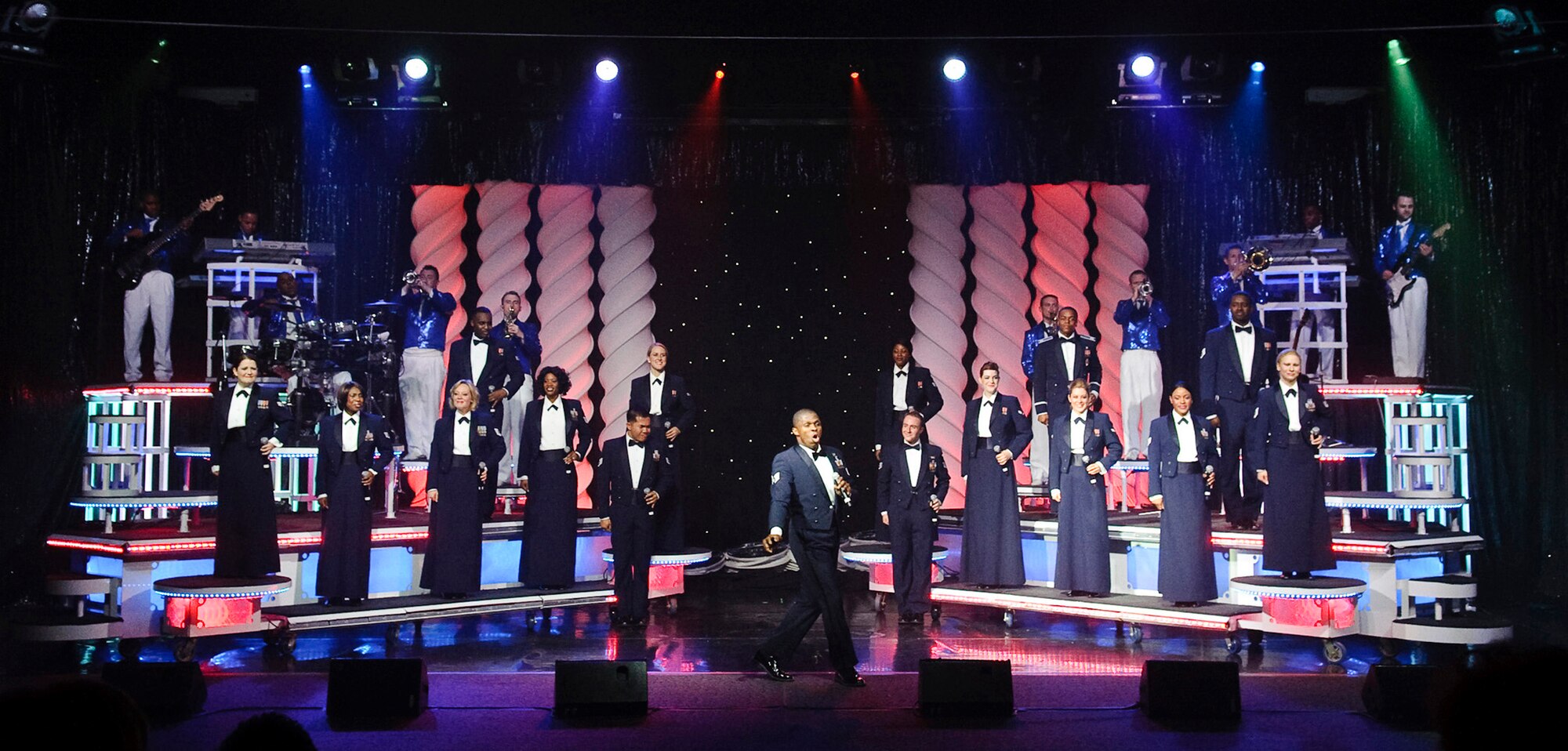 Staff Sgt. James Alston performs during the final concert of the 2010 "We Believe" tour March 27, 2011, at Trinity University in San Antonio. Sergeant Alston is a vocalist with Tops In Blue. (U.S. Air Force photo/Steve Thurow)
