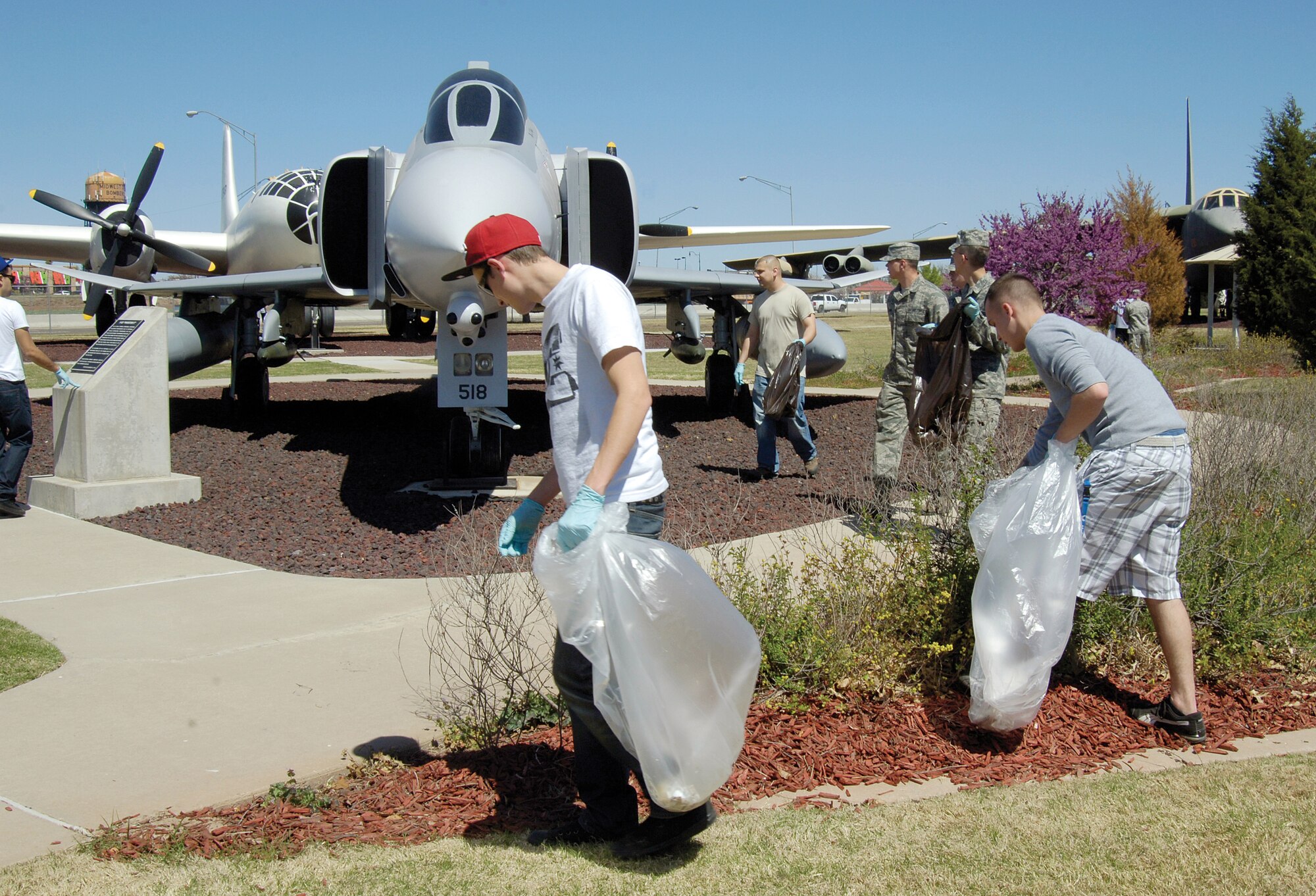 Seventy-one Tinker Air Force Base Airmen converged on the Maj. Charles B. Hall Memorial Airpark here April 1 for some spring cleaning.  The event was sponsored by the Network 56 and Tinker Junior Enlisted Council.   (Air Force photo by Margo Wright)
