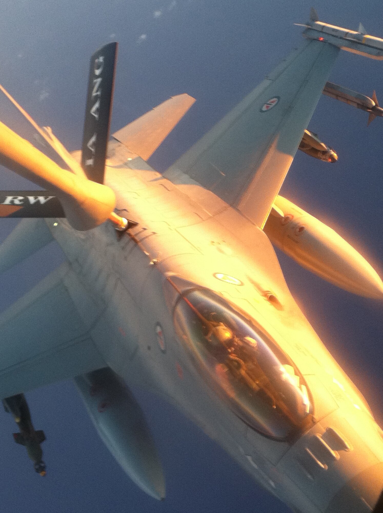 A KC-135 Stratotanker deployed from the 185th Air Refueling Wing, Sioux City, Iowa, provides aerial refueling for a Royal Norwegian Air Force F-16. The mission took place somewhere over the Mediterranean Sea in support of Operation Unified Protector April 8. The 313th AEW supports Operation Unified Protector, a NATO-led mission in Libya to protect civilian and civilian-populated areas under threat of attack. The 313th AEW provides aerial refueling to U.S. and Coalition aircraft with KC-135 Stratotankers and KC-10 Extenders.  (U.S. Air Force photo/Senior Airman Tyler Placie)
