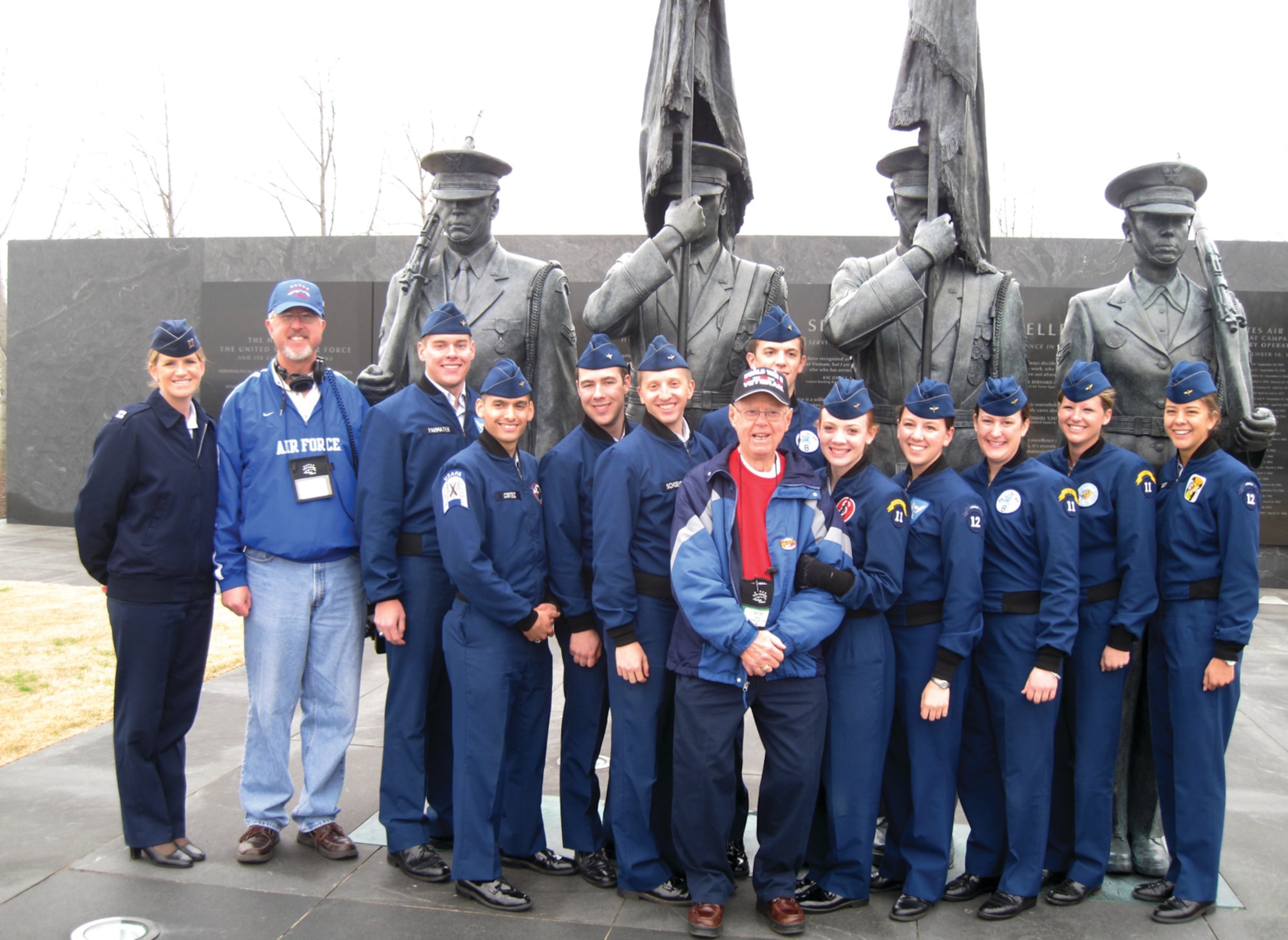 Cadet 2nd Class Sydney Croxton, Cadet Squadron 16, Cadet 1st Class Alexander Parmater, CS-16, Cadet 1st Class Jessica Gentry, CS-06, Cadet 1st Class Joseph Cortez, CS-25, Cadet 2nd Class Matthew Clinard, CS-08, Cadet 1st Class Erin Green, CS-08, Cadet 2nd Class Rachel Stanley, CS-14, Cadet 2nd Class Brandon Schoenfeldt, CS-39, Cadet 2nd Class Brandon Roberts, CS-05, and Cadet 1st Class Megan Hoskins, CS-10 pose with World War II veteran Bob Berry. at the  Air Force Memorial .  (U.S. Air Force Photo)