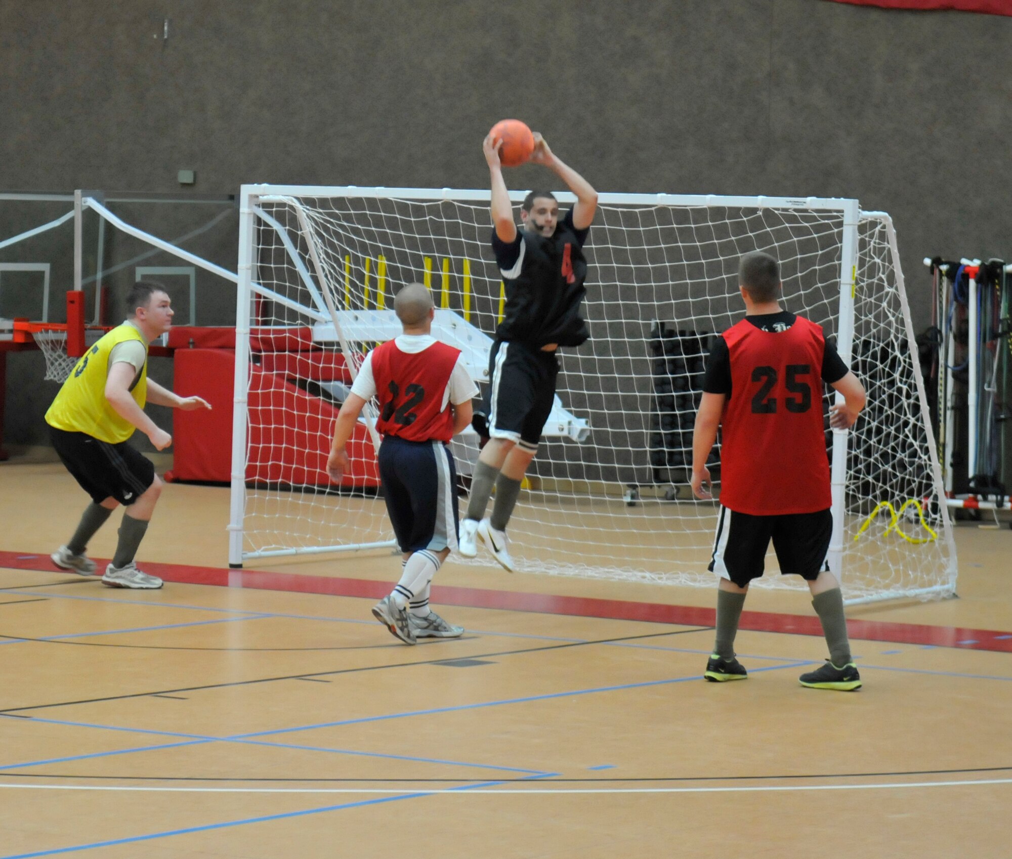 SPANGDAHLEM AIR BASE, Germany - Joseph Farsetta, 52nd Civil Engineer Squadron goalie, defends the goal from 702nd Munitions Support Squadron opponents during an intramural soccer game April 14 at the Skelton Memorial Fitness Center. The 702nd MUNSS defeated the 52nd CES 6-3. (U.S. Air Force photo/Airman 1st Class Brittney Frees)