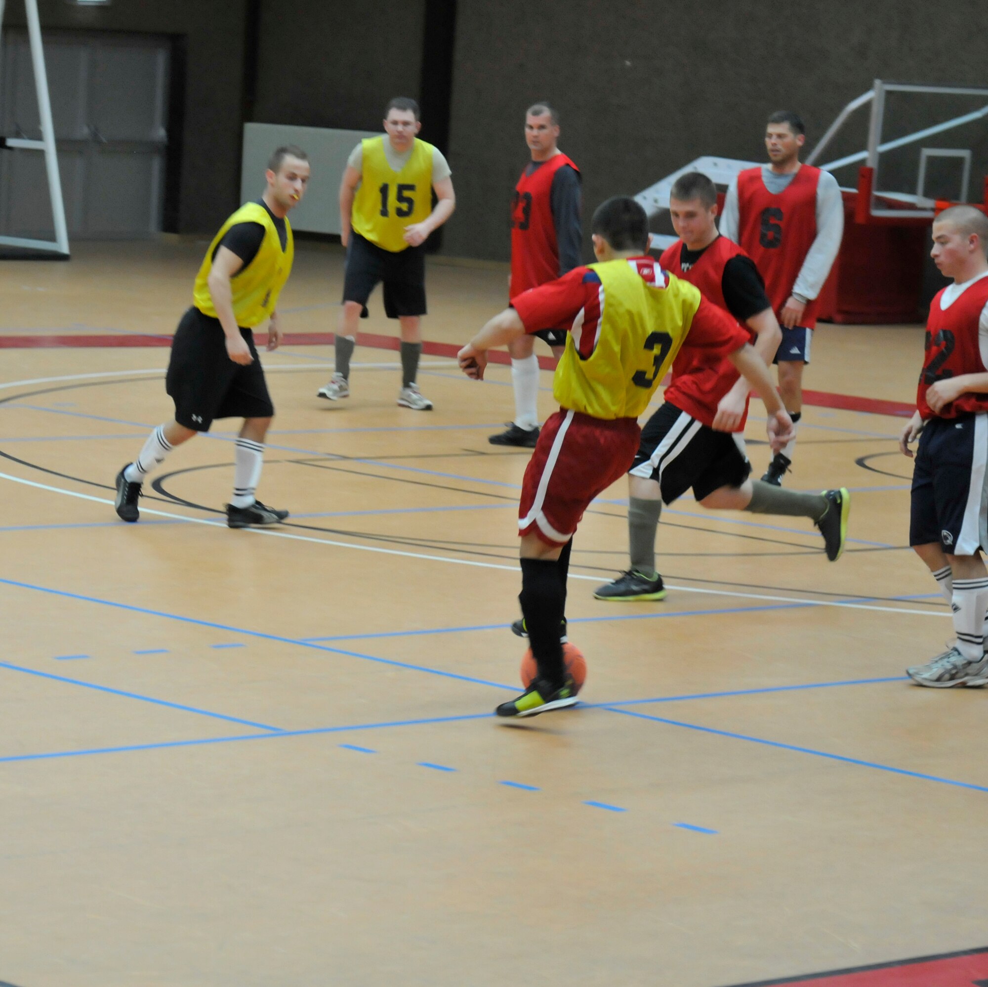 SPANGDAHLEM AIR BASE, Germany - Adan Gutierrez, 702nd Munitions Support Squadron soccer team member, steals the ball from Tyler Clemons, 52nd Civil Engineer Squadron team member, during an intramural soccer game April 14 at the Skelton Memorial Fitness Center. The 702nd MUNSS defeated the 52nd CES 6-3. (U.S. Air Force photo/Airman 1st Class Brittney Frees)