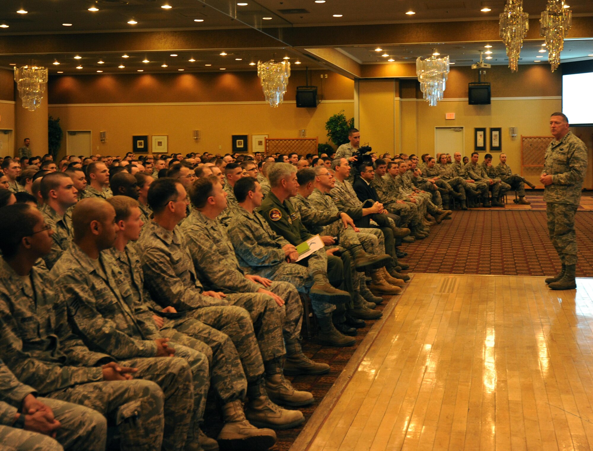 MISAWA AIR BASE, Japan -- Gen. Gary North, Pacific Air Forces commander, addresses servicemembers here April 15, 2011. Gen. North expressed his gratitude for their quick response to the natural disaster and subsequent recovery operations after the recent earthquake and tsunami, stating the servicemembers' efforts will be remembered for years to come by both U.S. and Japanese citizens. (U.S. Air Force Photo by SSgt April Quintanilla/RELEASED)

