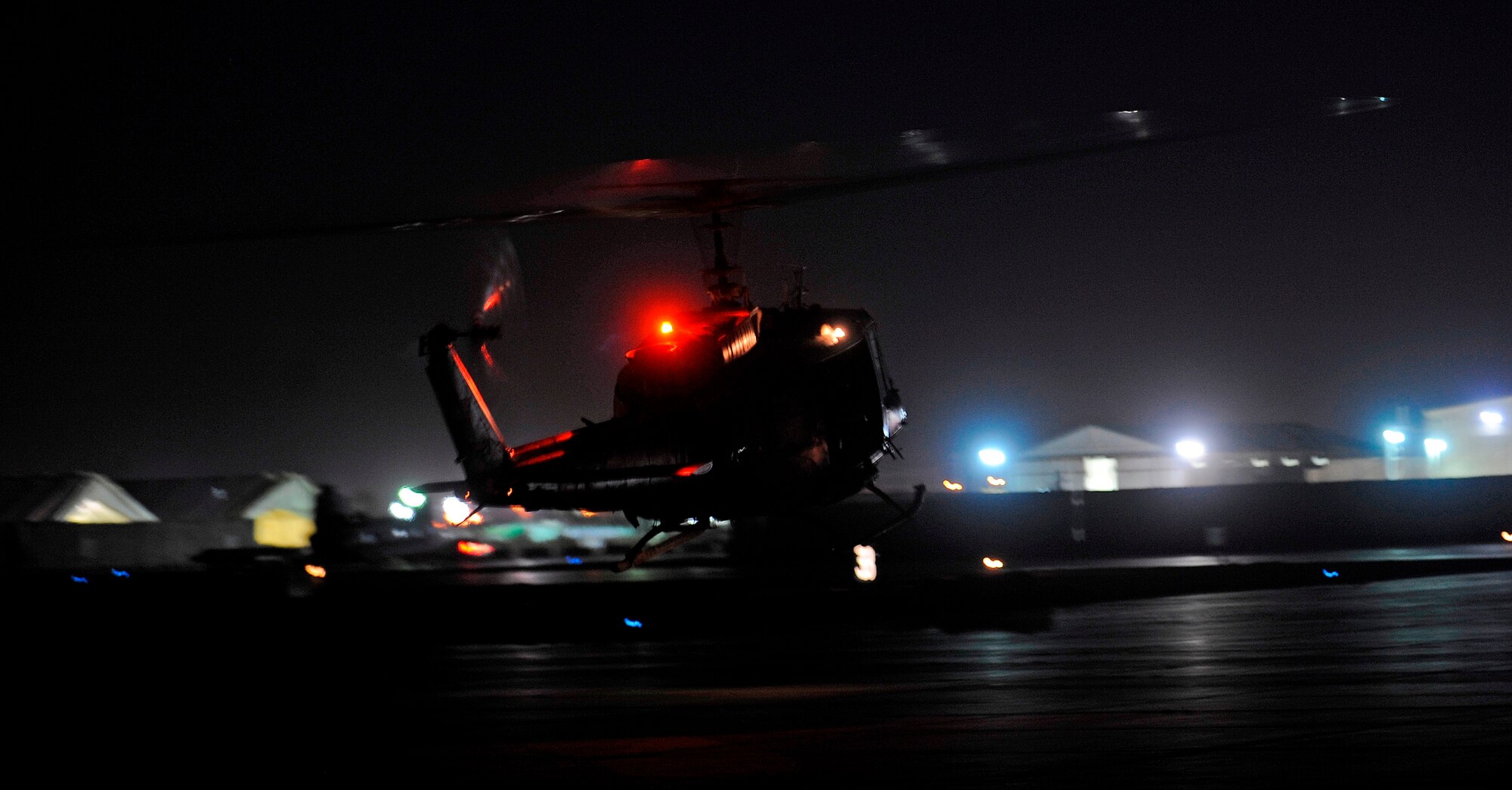 CAMP TAJI, Iraq -- An Iraqi Army Aviation Command UH-1 Huey takes off for the last airborne U.S advisory mission March 15. After more than five years advising and training alongside Iraqi pilots in the cockpit, U.S. pilots now advise their Iraqi partners on strategic issues concerning the fleet of 16 Huey helicopters assigned here. (U.S. Air Force/Tech. Sgt. Jason Lake)