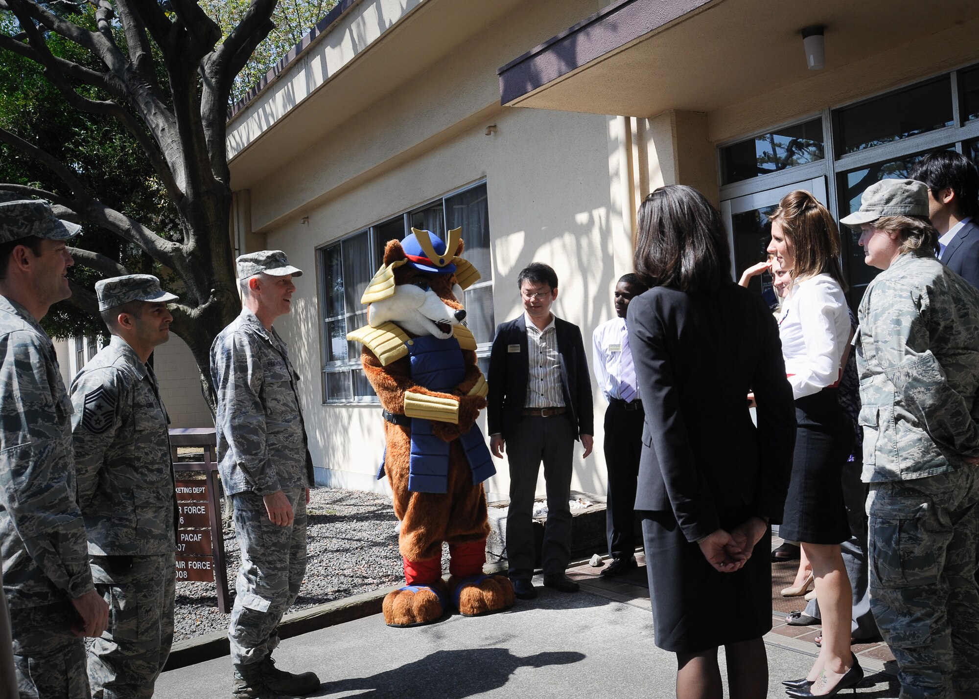 YOKOTA AIR BASE, Japan -- Wing leadership speaks to members of the 374th Force Support Squadron Marketing Team here April 14, 2011. The team was recognized for winning the Air Force-level Marketing Program of the Year. (U.S. Air Force photo/Airman 1st Class Andrea Salazar)