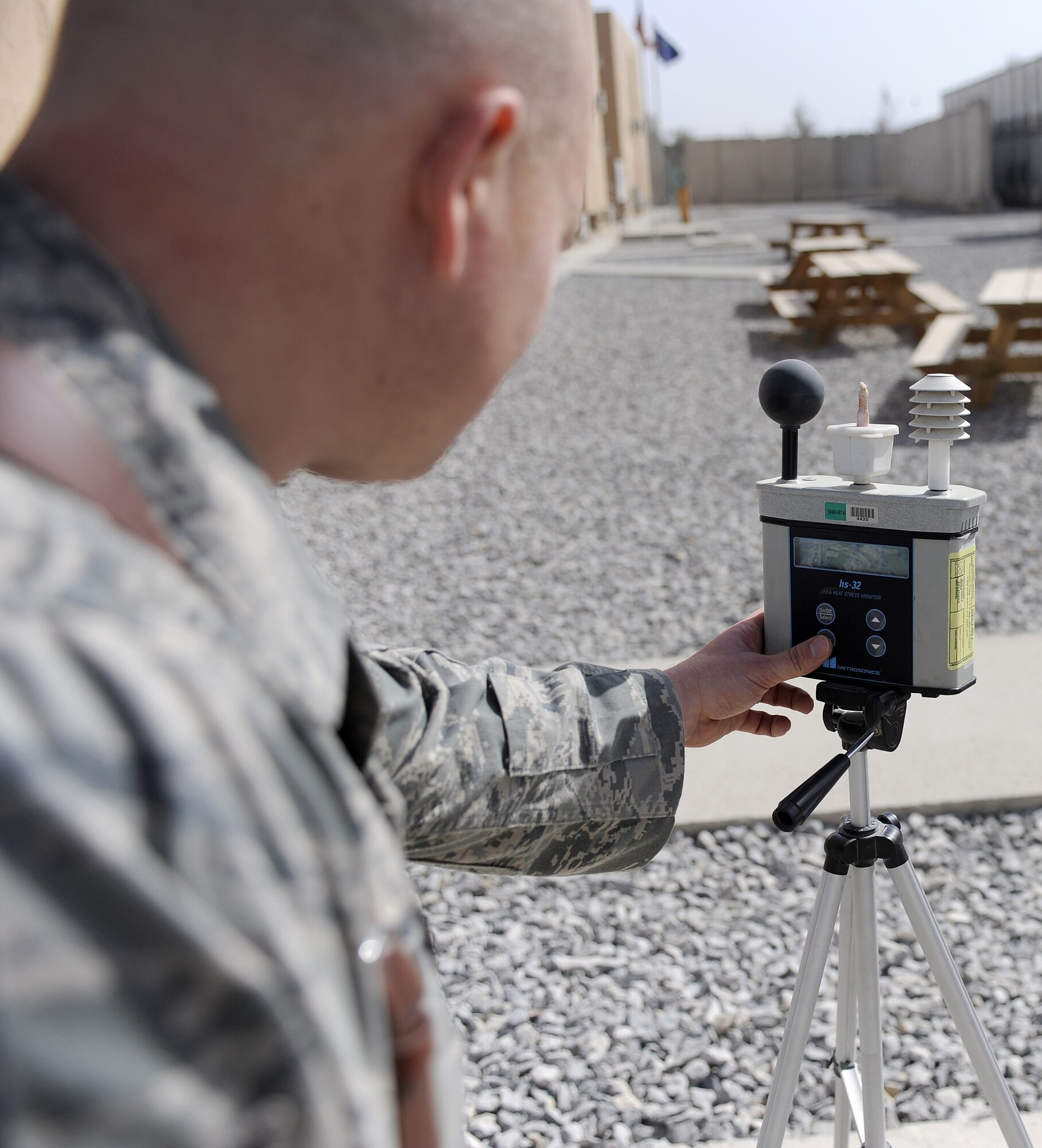 Tech. Sgt. Chad Brock takes an outdoor temperature reading April 11, 2011, at Kandahar Airfield, Afghanistan. The machine is slightly more complicated than a household thermometer; it is a computer designed to find the Wet Bulb Globe Temperature, which measures not just temperature, but overall physical stress created by weather conditions. A computer takes into account things like humidity, wind speed and radiant heat exposure. Sergeant Brock is a bioenvironmental engineering technician assigned to the 451st Expeditionary Air Wing. (U.S. Air Force photo/Senior Airman Willard E. Grande II)